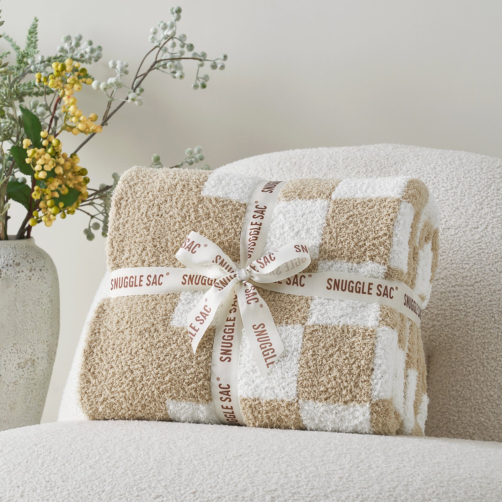 Checkered Feather Yarn Knit Throw Blanket in Beige & White neatly folded as gift packaging, perfect for home decor and gifting. #color_Beige & White