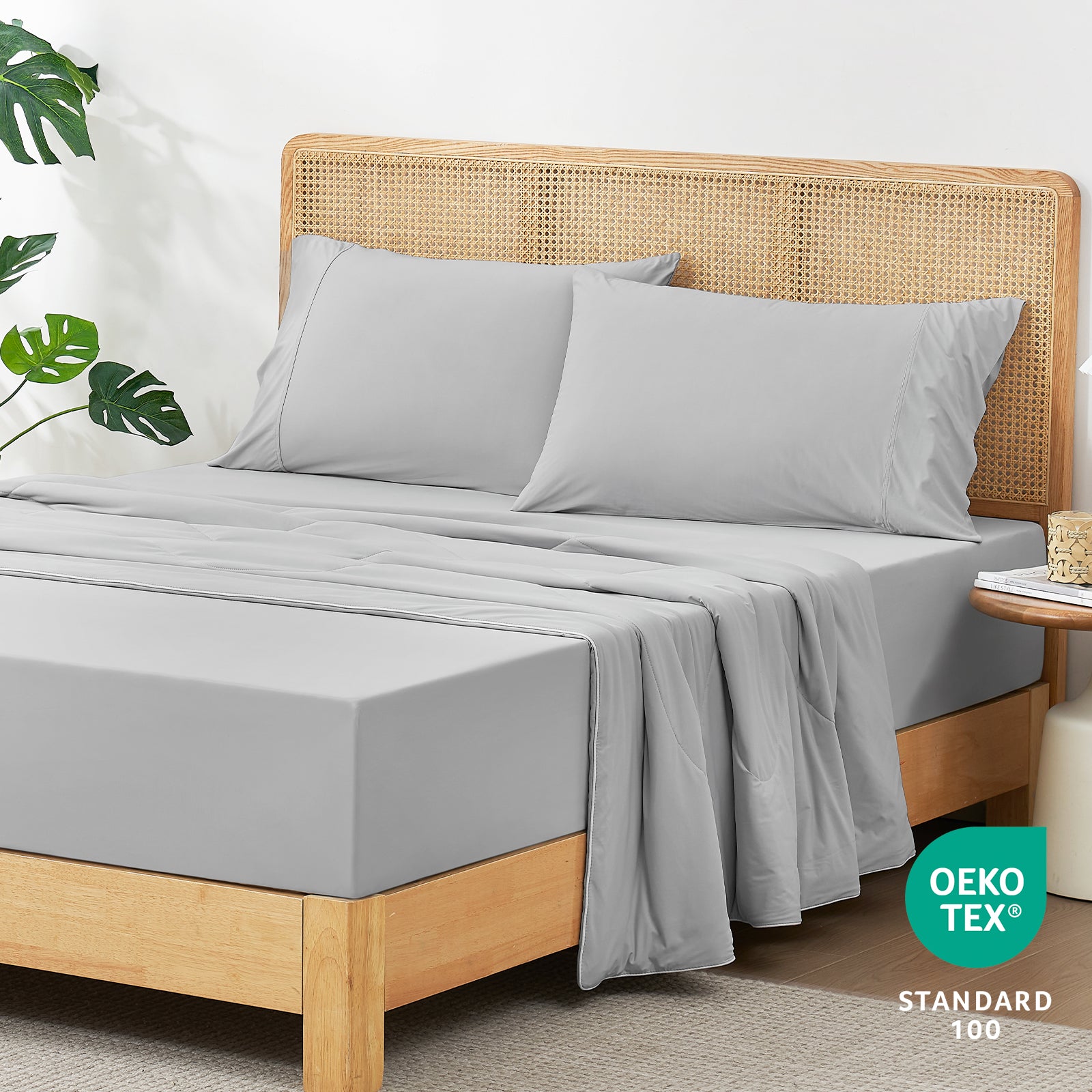 Light gray cooling fitted sheet set on bed, Oeko-Tex certified Cozybliss bedding for comfortable sleep #Color_Light Grey