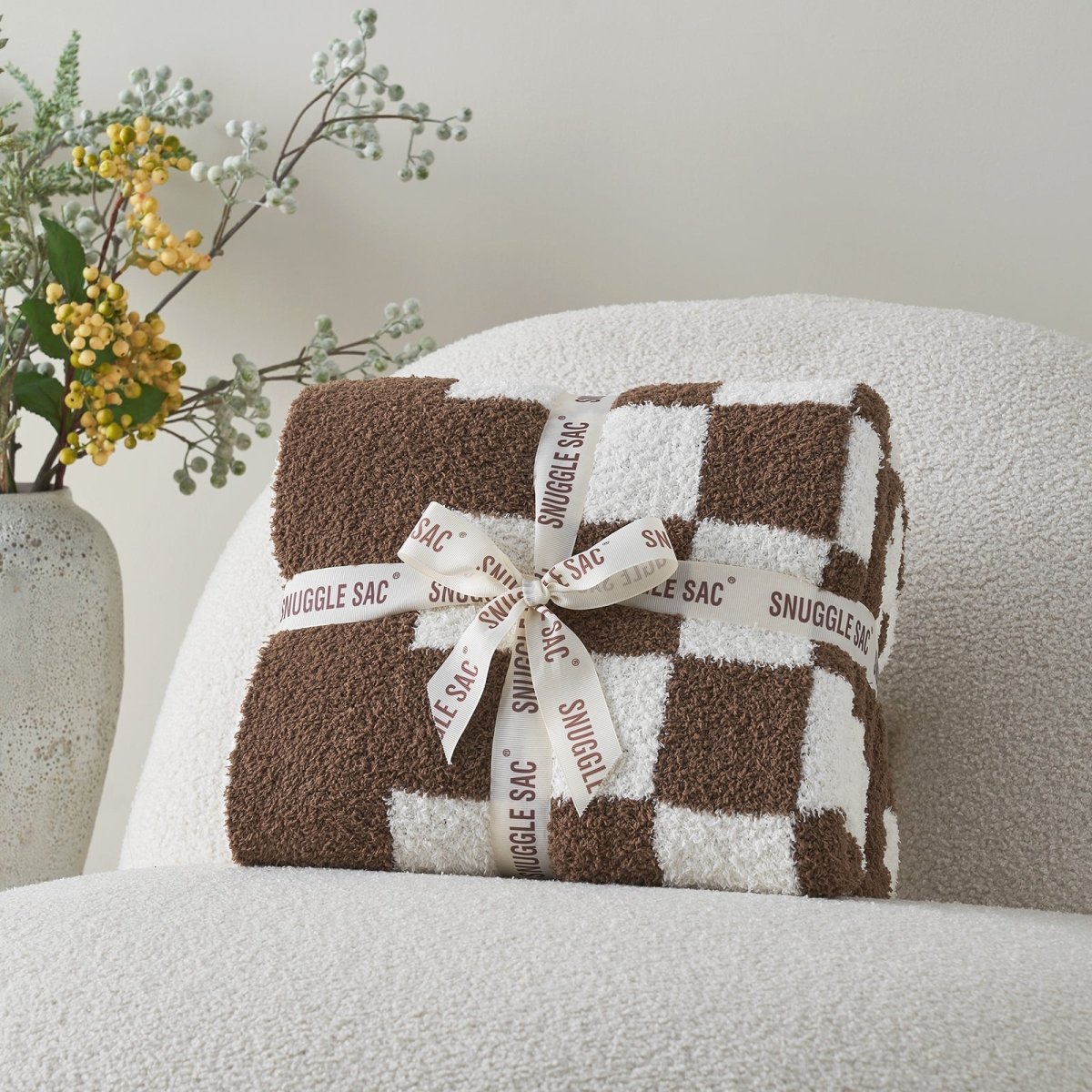 Checkered Feather Yarn Knit Throw Blanket in Brown neatly folded as gift packaging, ideal for holidays and special occasions. #color_Brown