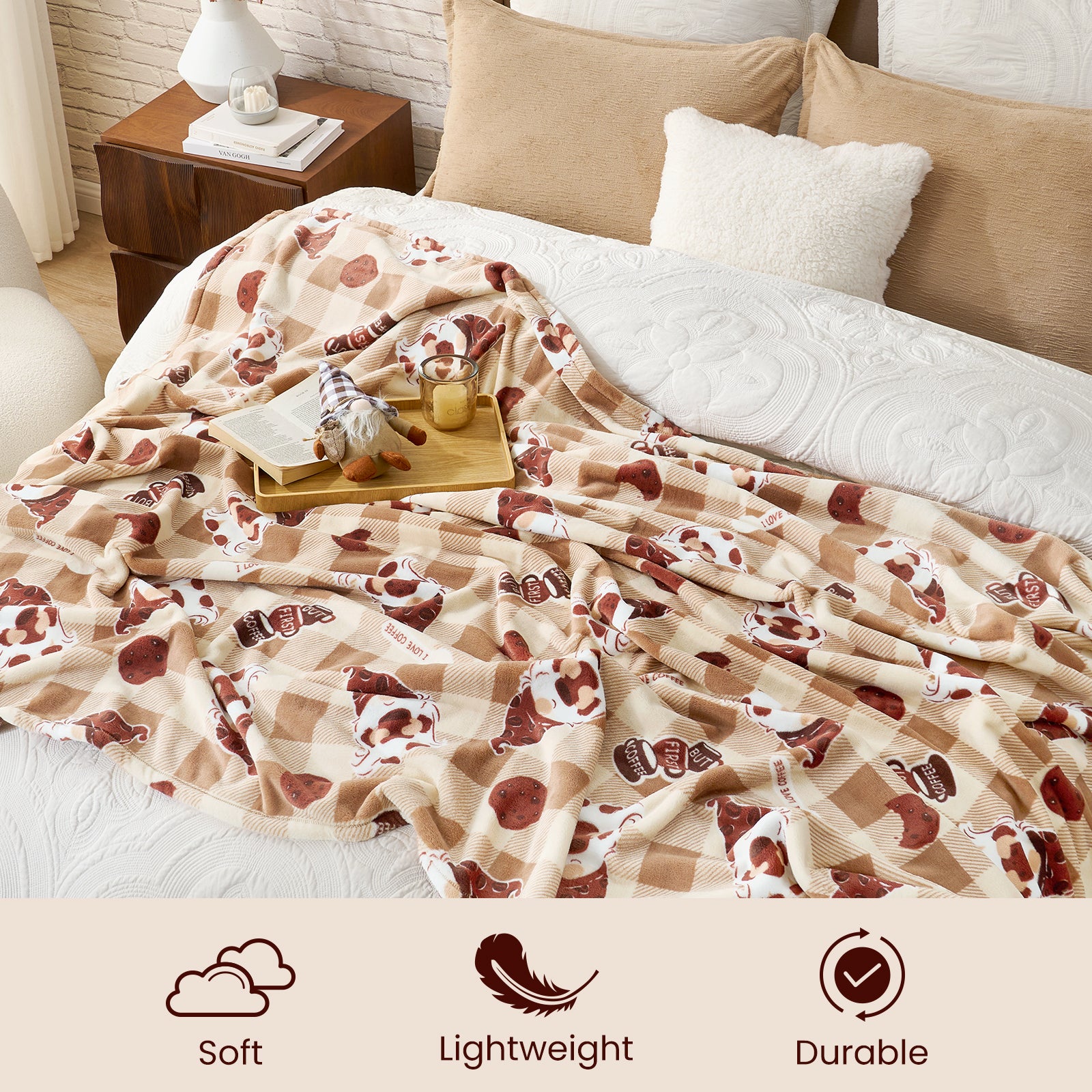 Flannel blanket with cat pattern on a bed, featuring soft, lightweight, and durable icons. #color_Coffee Gnome Brown