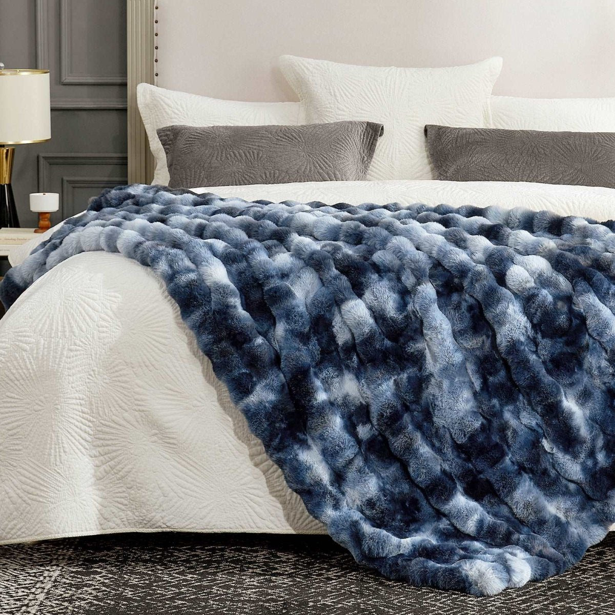 Tie-dye blue faux fur blanket on cozy bed. Cozy and soft blanket for bedroom comfort. #color_Tie-dye Blue