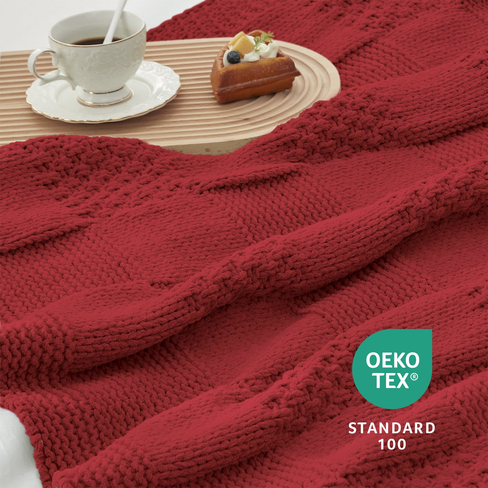 Close-up of Checkered Chenille Knit Throw Blanket in Red showcasing textured chenille knit pattern with a cozy tea and dessert setting. #color_Christmas Red