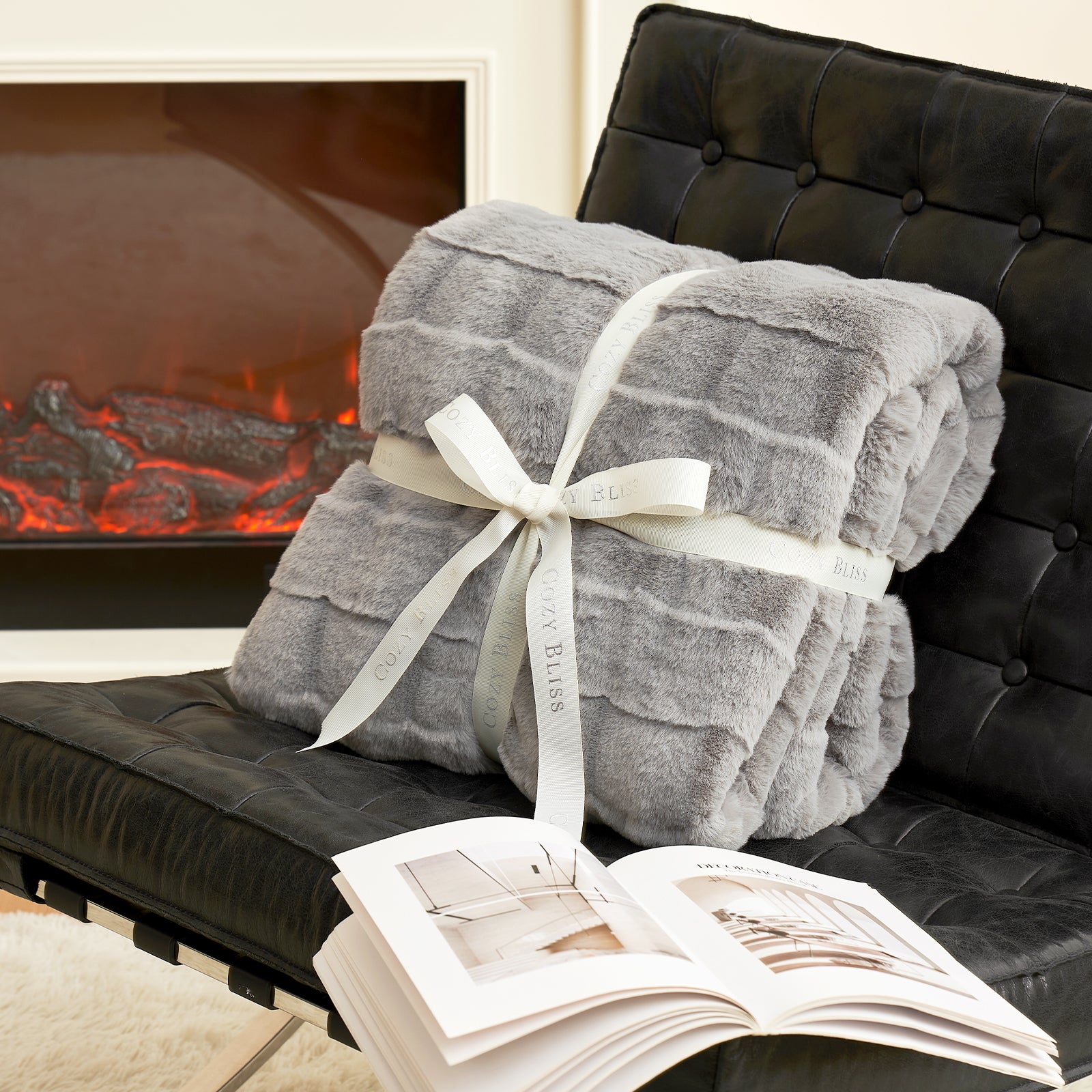 Cozy Bliss gray faux fur throw blanket, cross-striped design, soft and stylish, perfect for cozy bedroom decor. #color_Grey