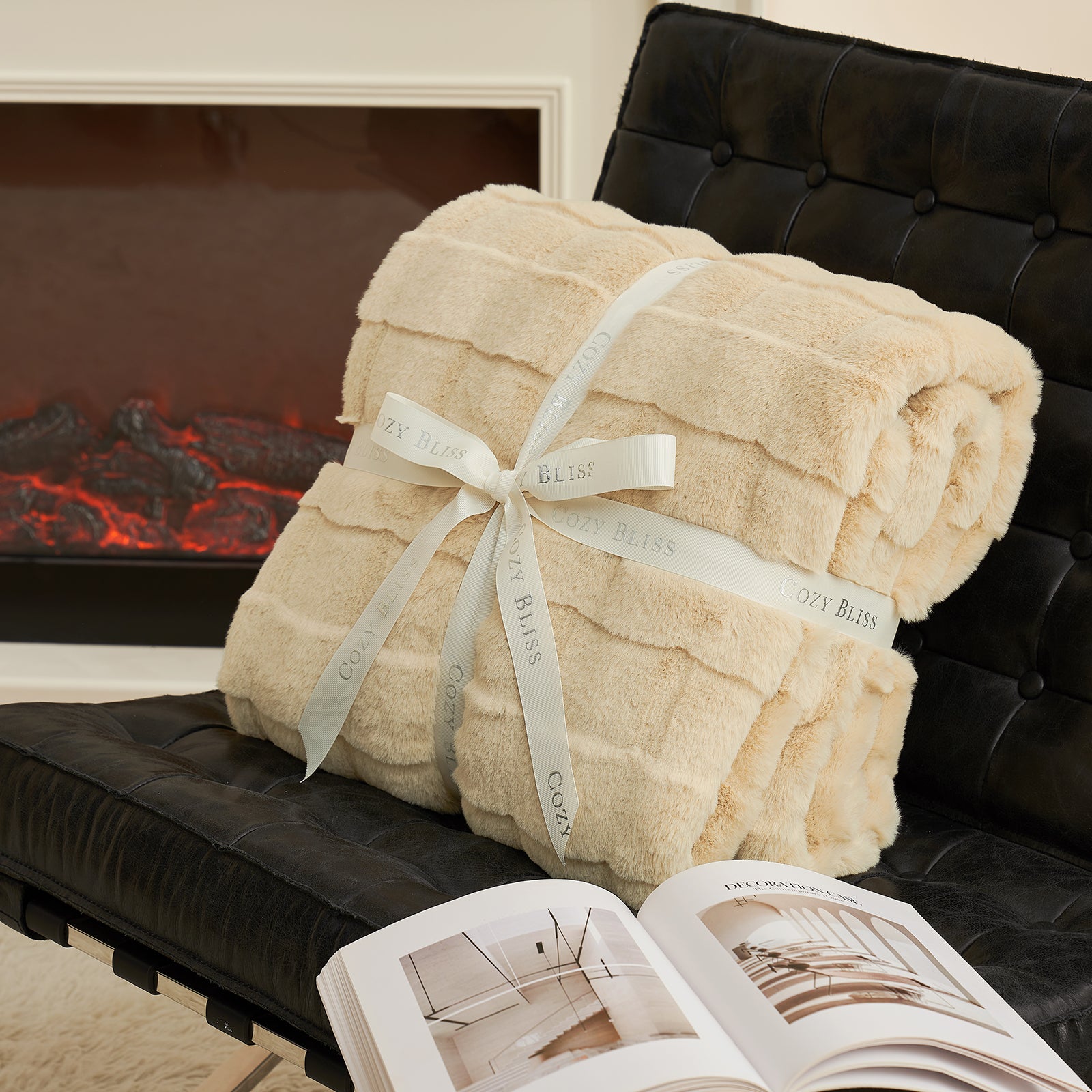 Cozy Bliss beige cross-striped faux fur throw blanket on a black chair, perfect for cozy bedroom decor. #color_Beige