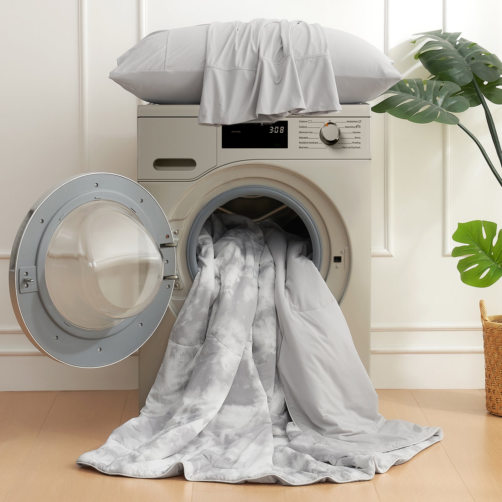 Laundry dryer with clothes coming out in a home setting #Color_Tie-Dye Grey
