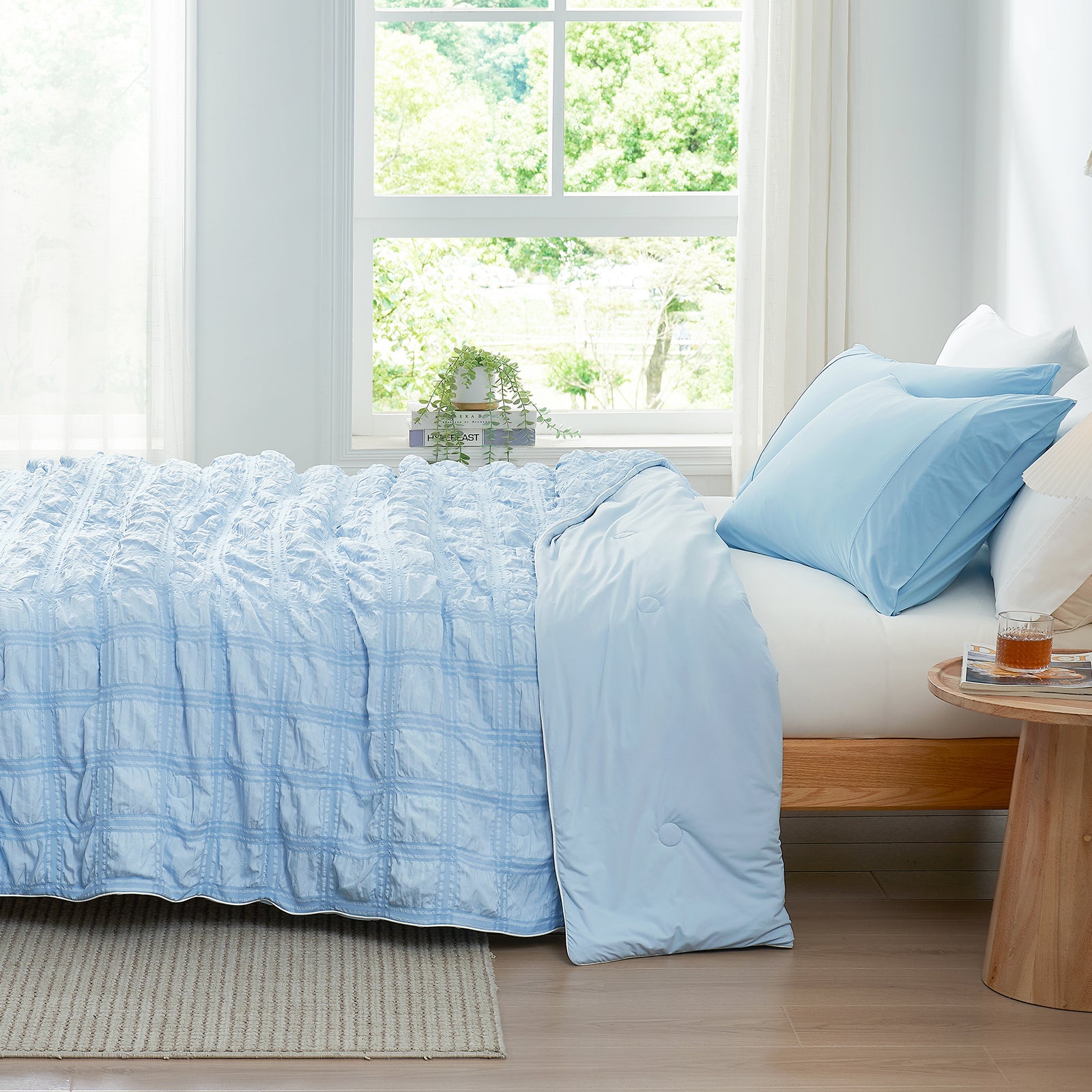Blue seersucker cooling comforter on bed, cozy bedding #Color_Blue Plaid