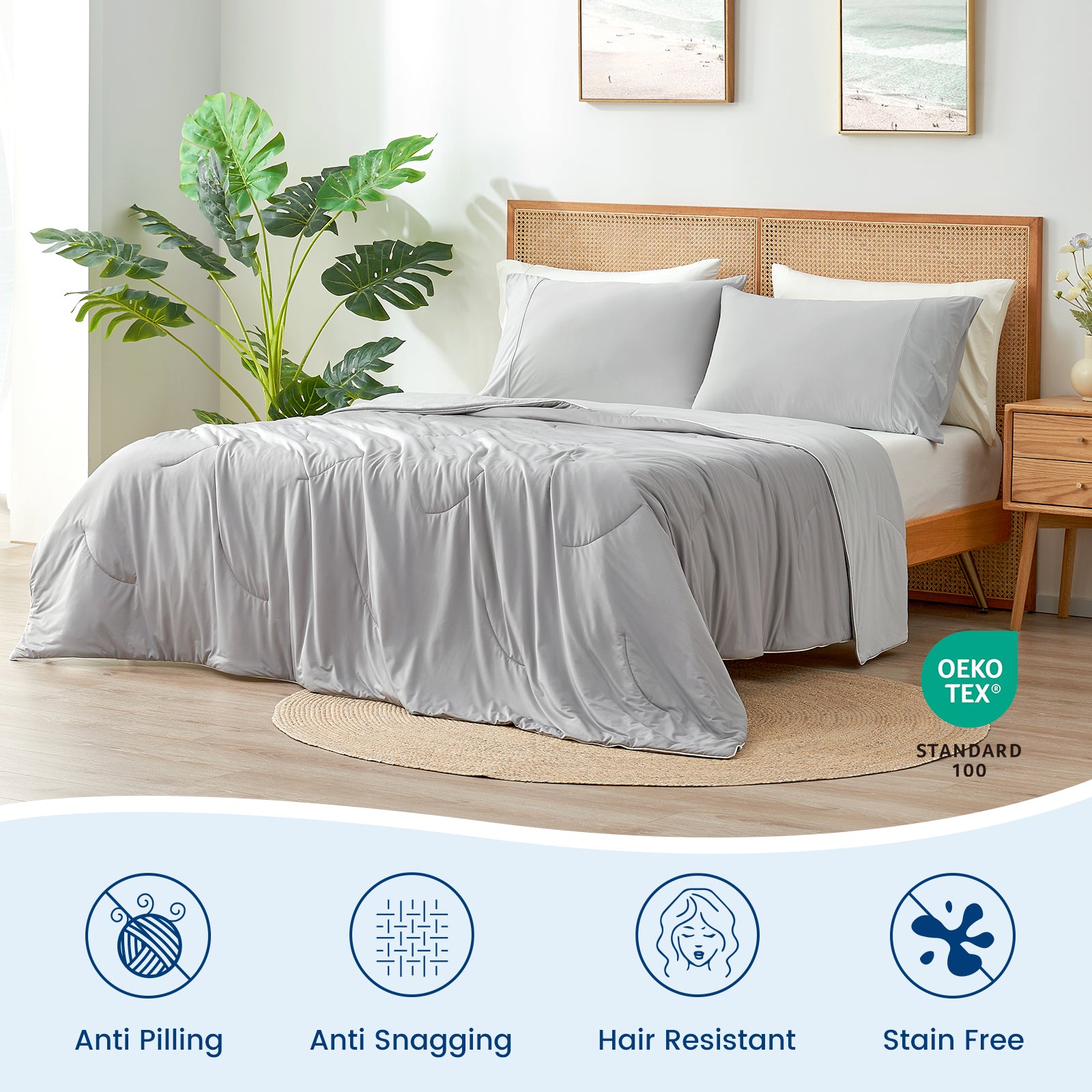 Cozy Bliss light grey cooling comforter on bed, OEKO-TEX certified, anti-pilling, and stain-free #Color_Cool Grey