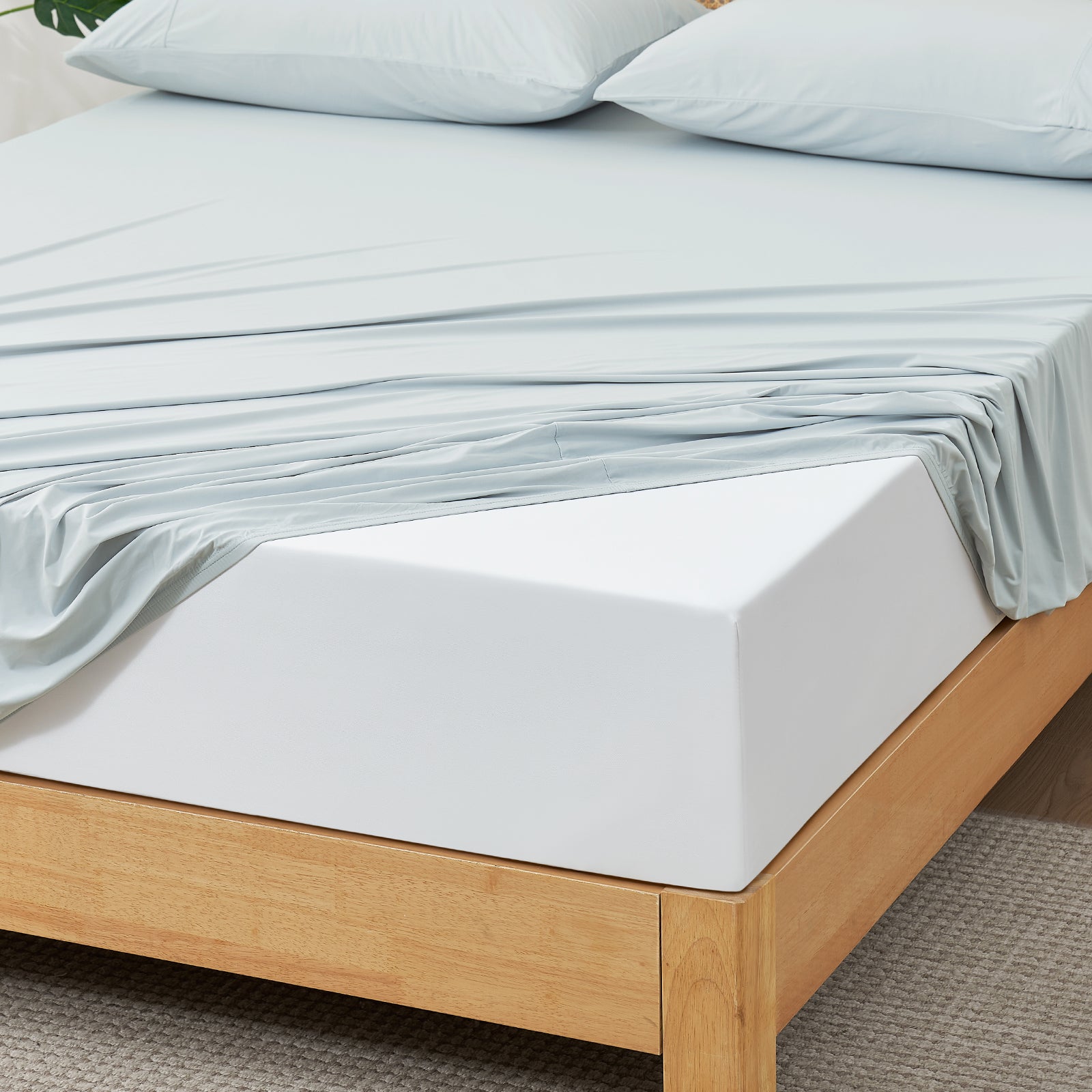 Light blue cooling fitted sheet on a white mattress, perfect fit #Color_Cool Blue