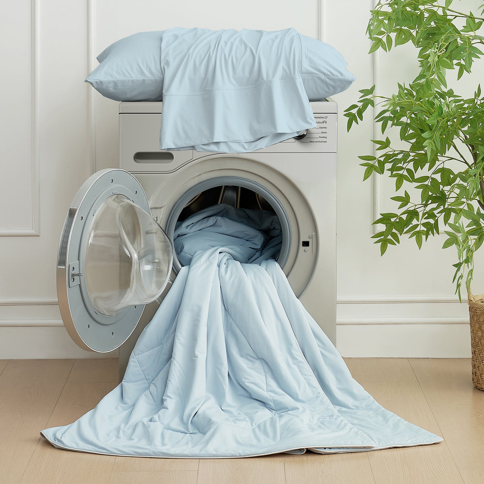 Cozy Bliss cooling blanketand bedding set in washing machine, machine washable #Color_Blue