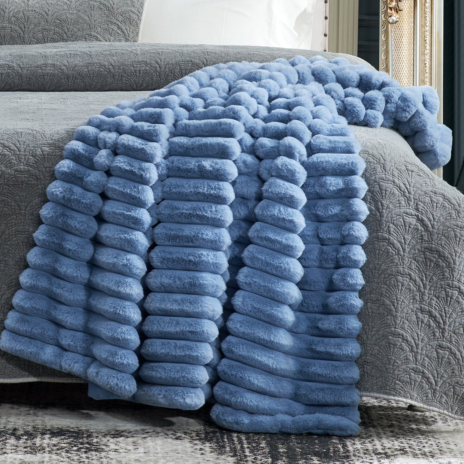 Cozy Bliss Blue Striped Faux Fur Blanket on a bed, offering ultra-soft comfort and stylish design #color_Light Blue