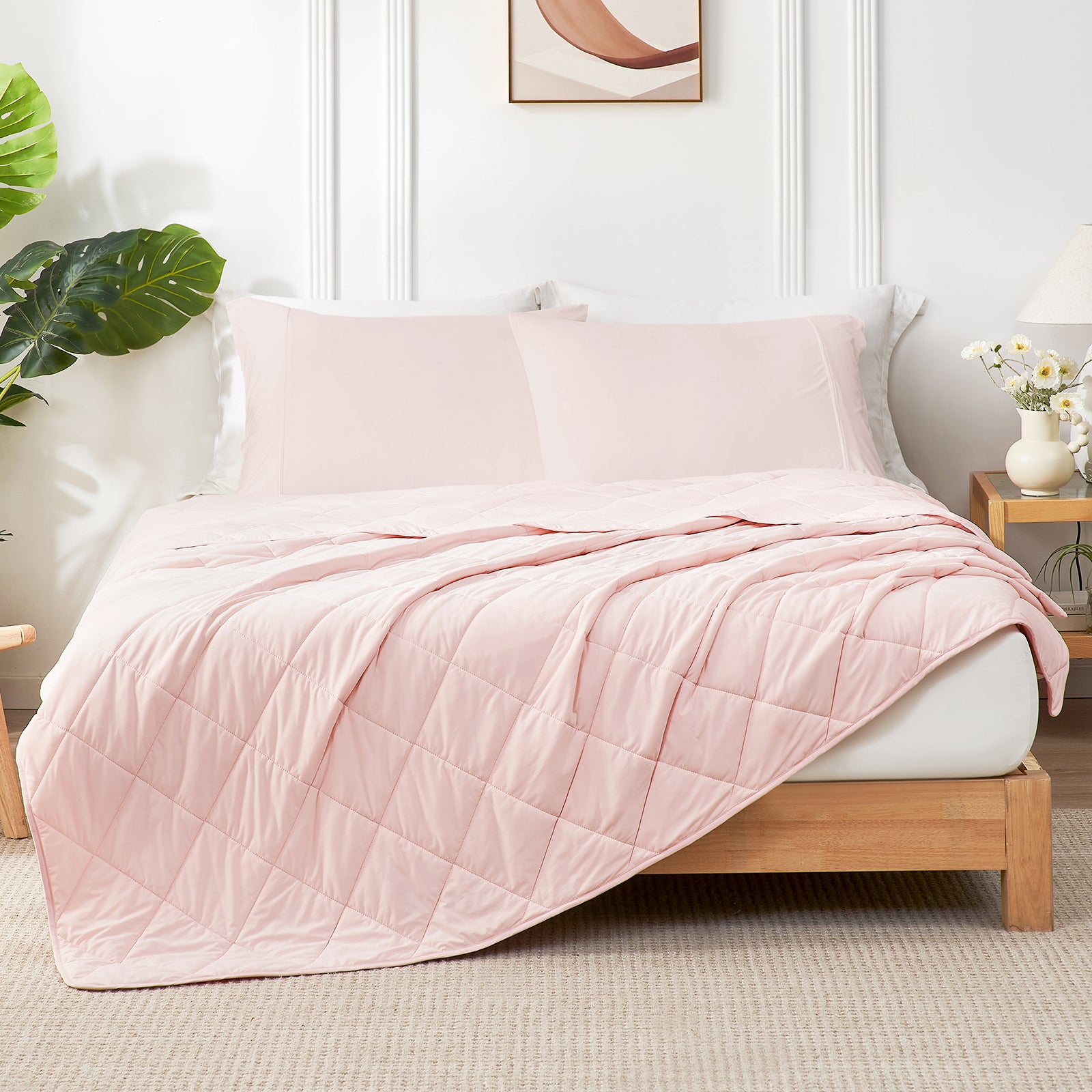 Cool pink Cozy Bliss Airflow Breathable Cooling Blanket on bed. #Color_Cool Pink