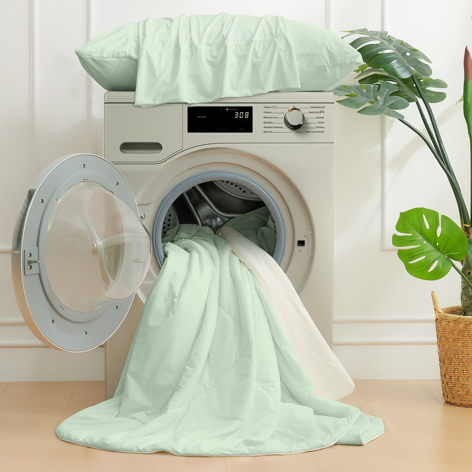Light mint green Cozy Bliss cooling comforter, machine washable. Breathable bedding for hot sleepers, easy care. #Color_Light Mint Green/Cream