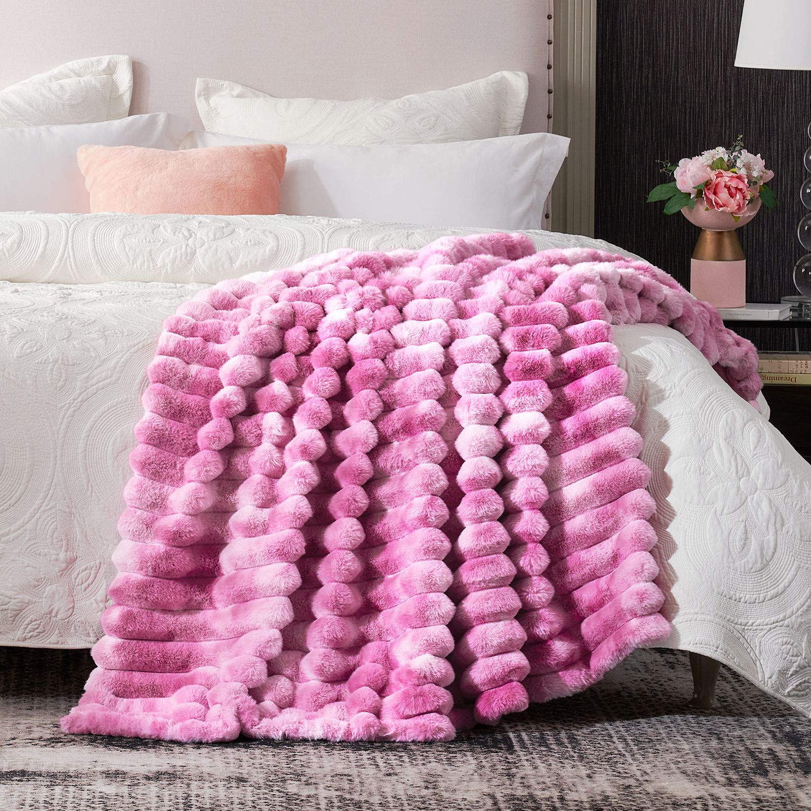 Cozy Bliss pink striped faux fur throw blanket on bed, luxurious and soft, cozy bedding. #color_Tie-dye Pink