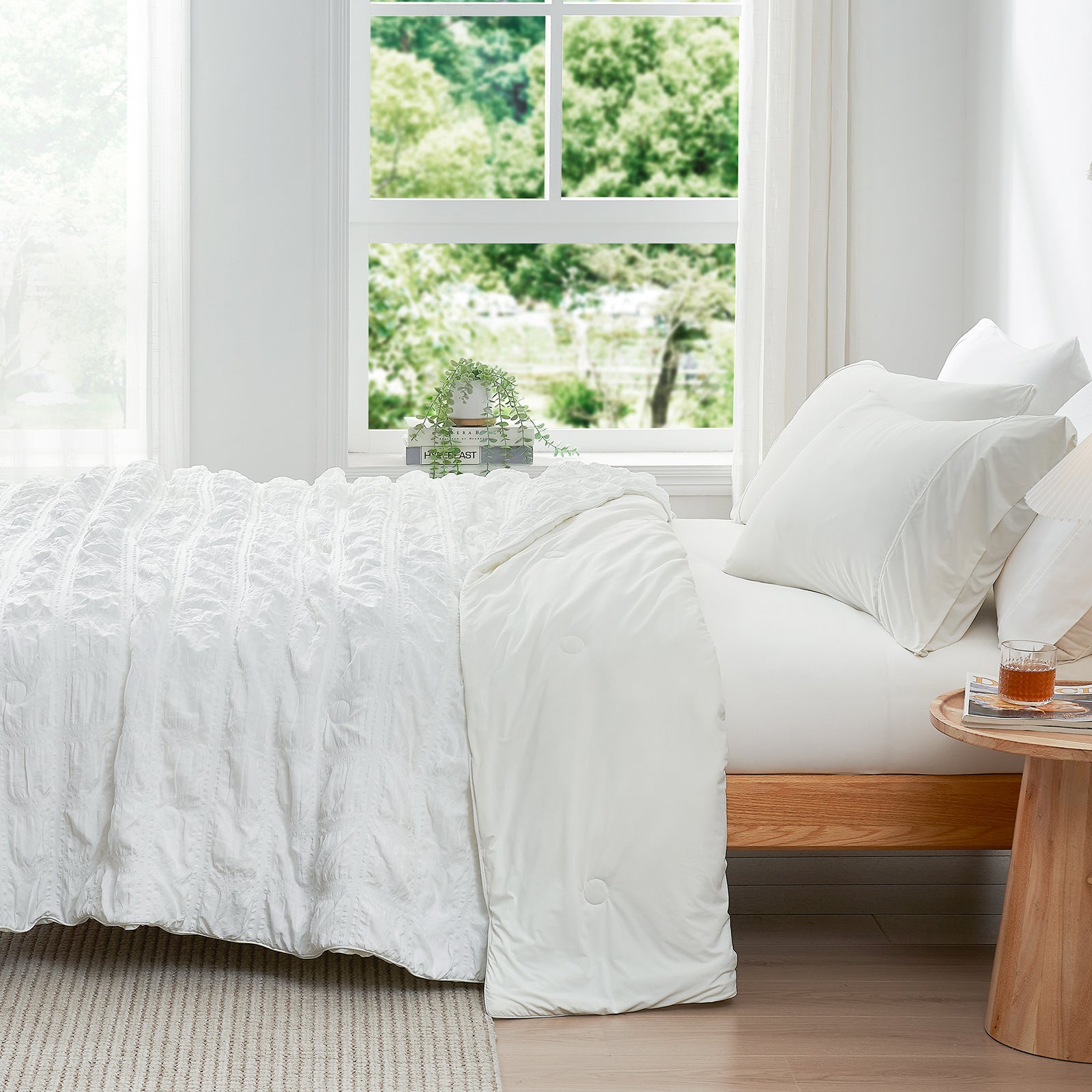White seersucker cooling comforter set on a bed, cozy bedding #Color_White Plaid
