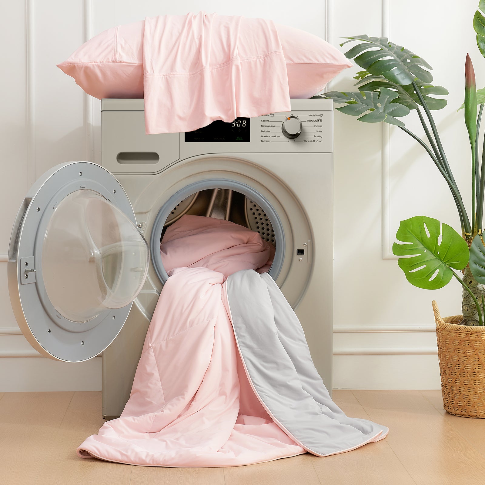 Light pink Cozy Bliss cooling comforter, machine washable. Breathable bedding for hot sleepers, easy care. #Color_Pink/Grey