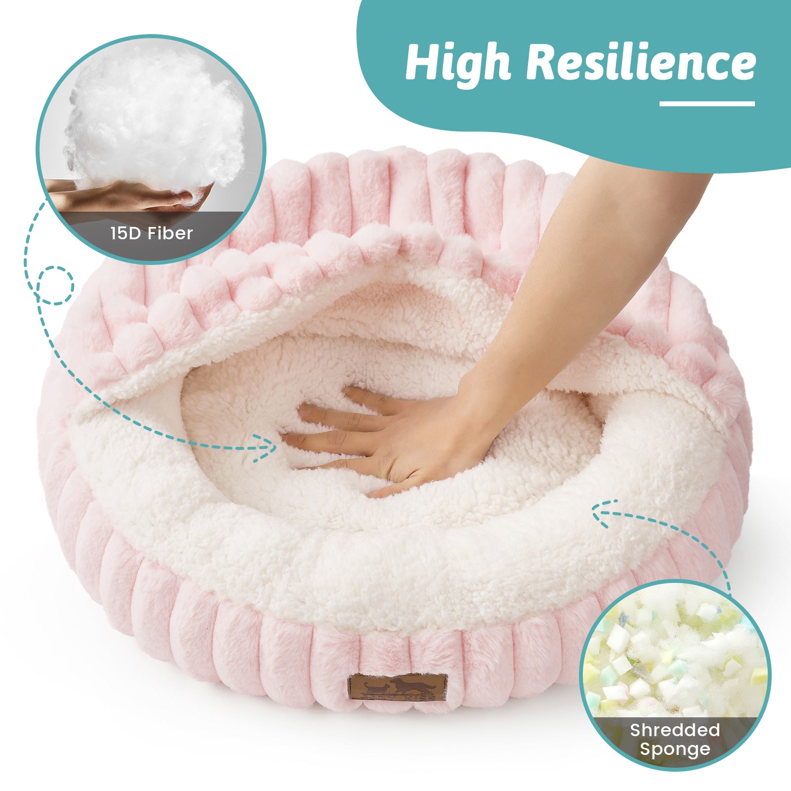 Pink and white pet bed with hand pressing down, highlighting resilience and plushness.#color_Pink