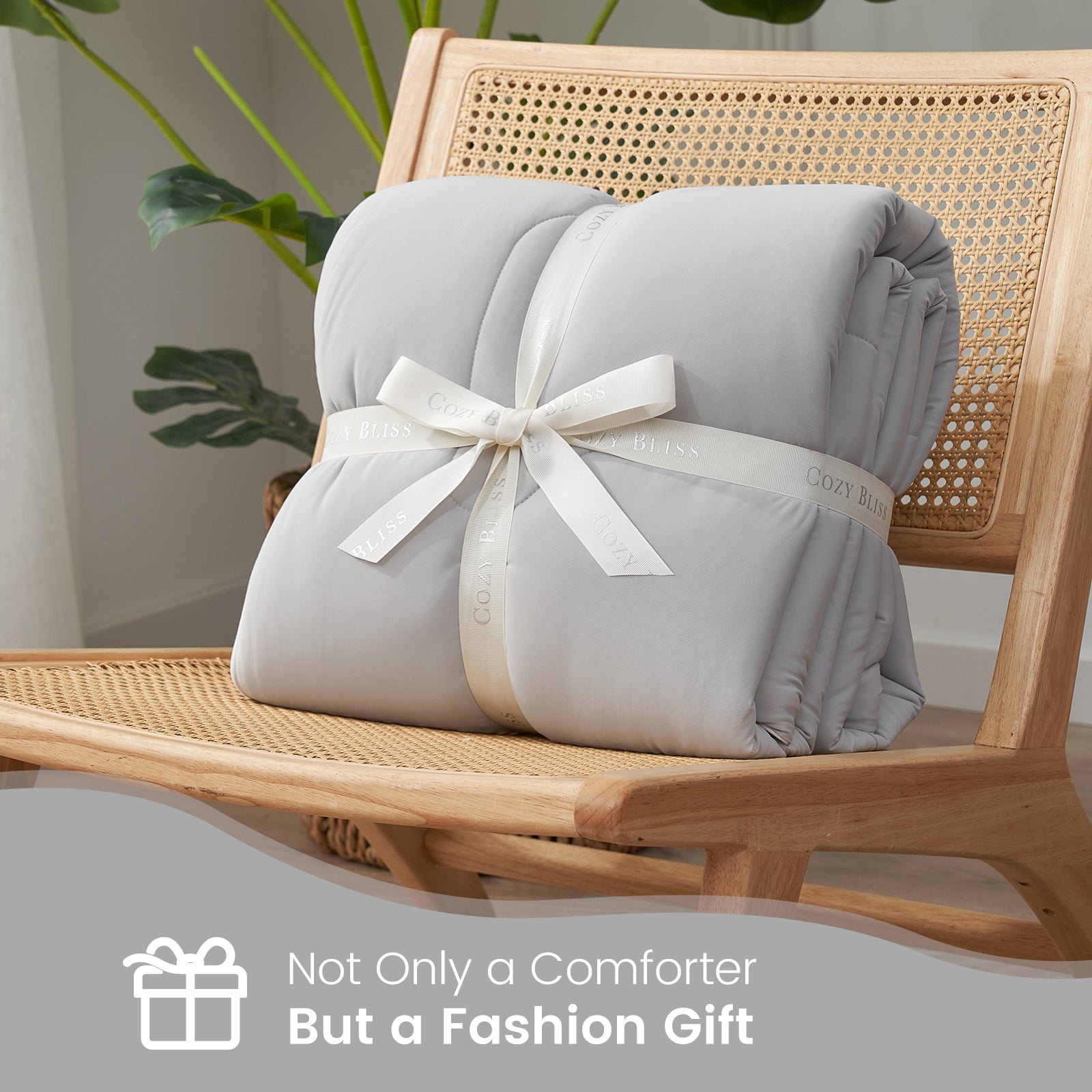 Cozy Bliss cooling comforter in gray, presented as a gift, perfect for stylish bedrooms and gifting. #color_Cool Grey