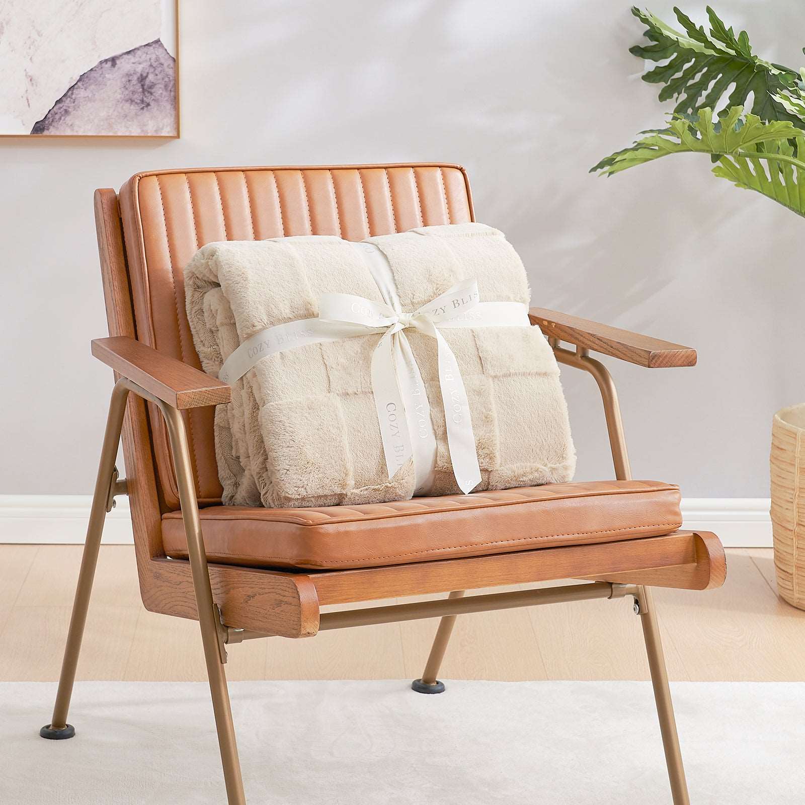 Cozy Bliss Faux Fur Throw Blanket, gift-ready on armchair #color_Beige