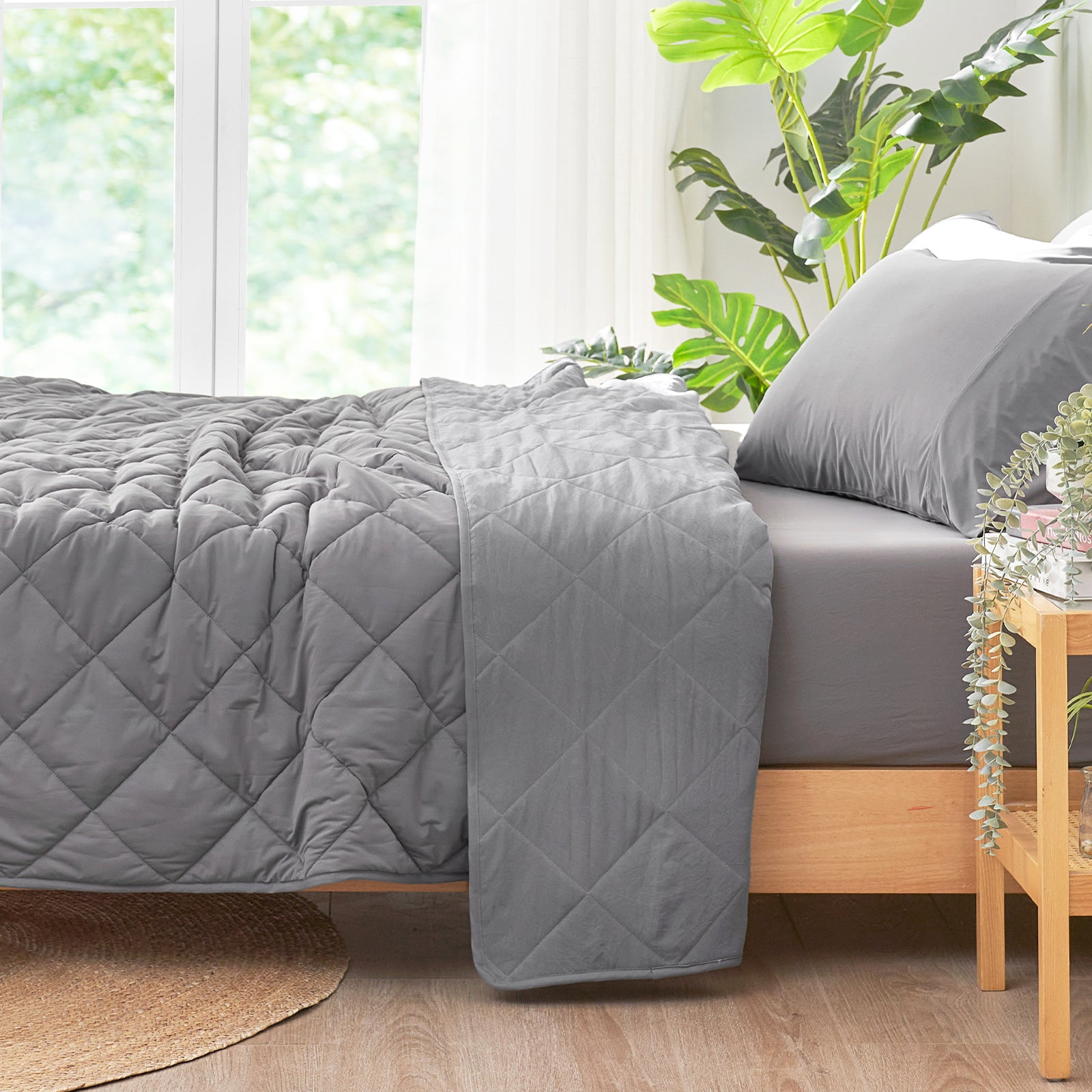 Gray cooling blanket on a bed, soft and breathable, perfect for hot sleepers and cozy bedding #Color_Dark Grey