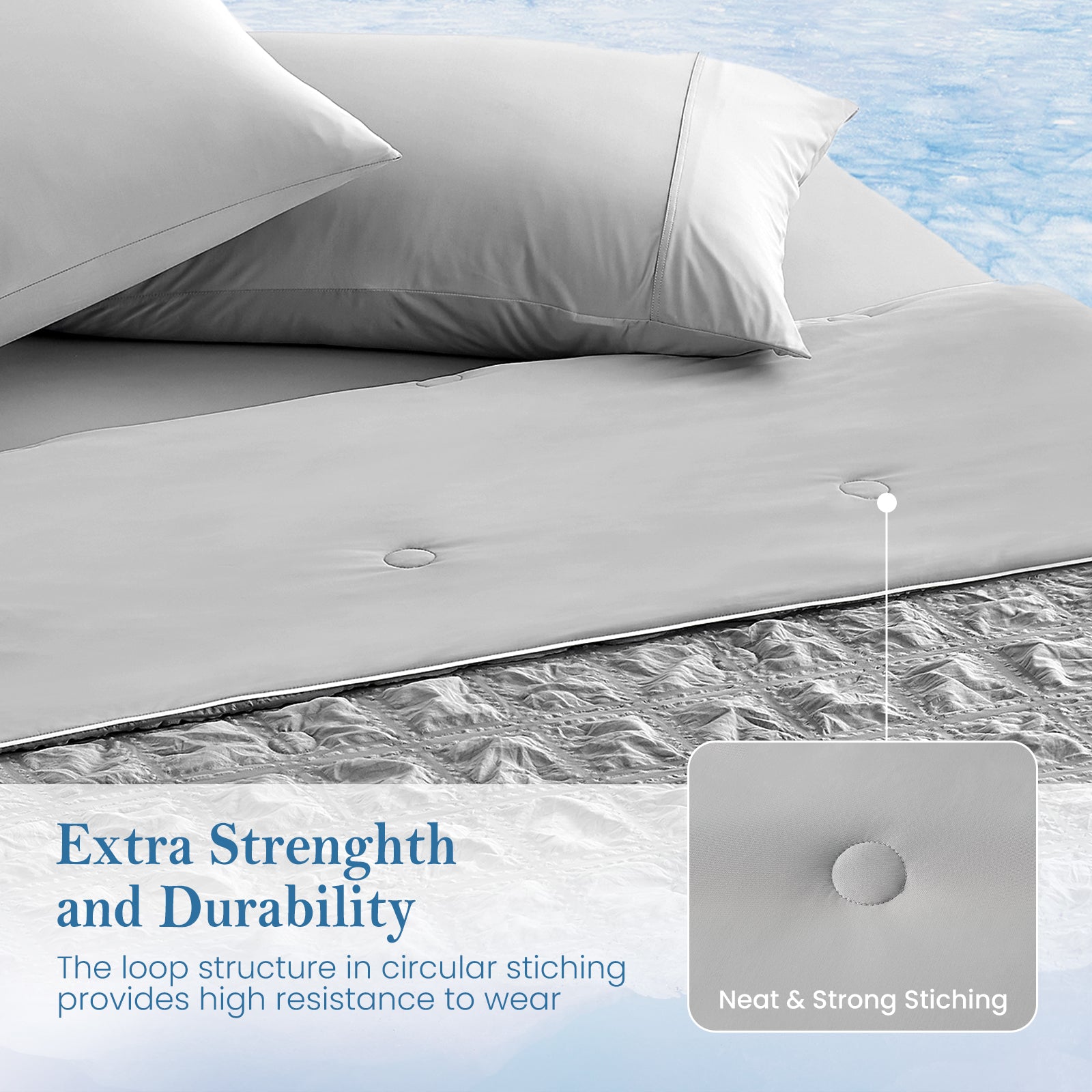 Top view of Cozy Bliss dark grey seersucker plaid cooling comforter with extra strength and durability.#color_Dark Grey