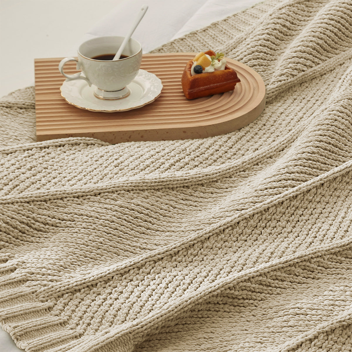 Chevron Chenille Knit Throw Blanket in Beige close-up view, showcasing soft chenille texture and detailed knit pattern. #color_Beige