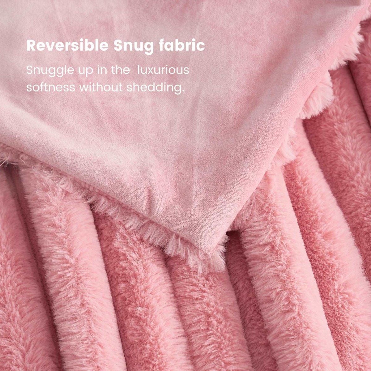 Close-up of Cozy Bliss pink faux fur blanket showing Reversible Snug fabric for ultimate comfort and softness. #color_Hot Pink