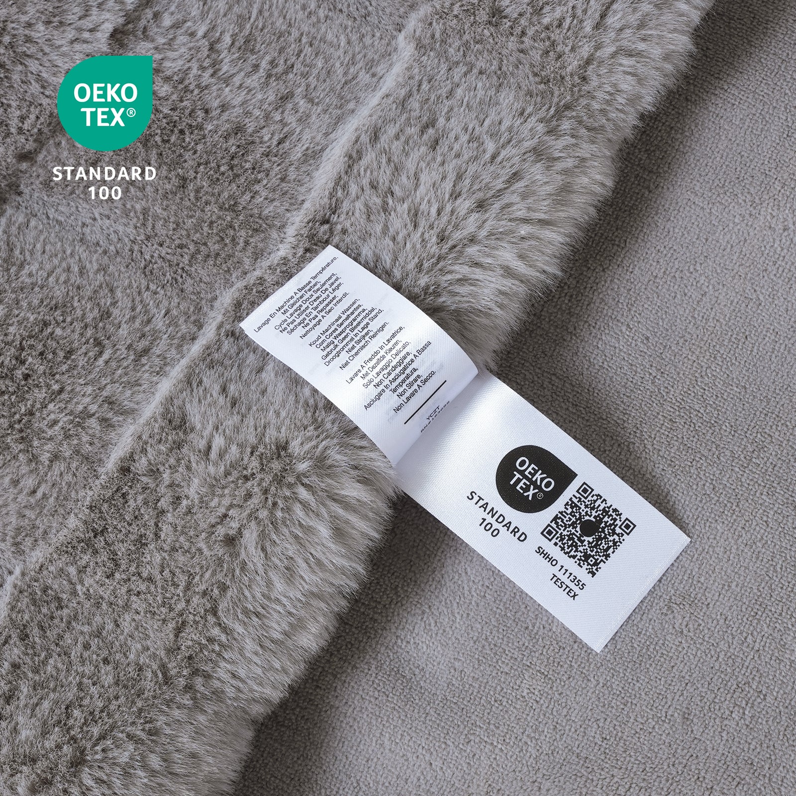 Cozybliss gray faux fur throw blanket, OEKO-TEX certified for safety and quality. Perfect for a cozy home #color_Grey