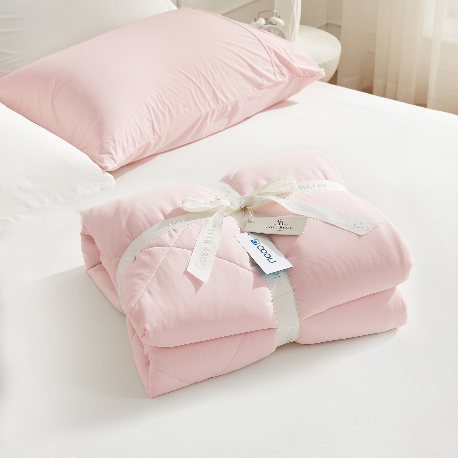 Cozy Bliss pink cooling comforter gift set, breathable bedding for hot sleepers, COOLI tag. #Color_Pink/Grey
