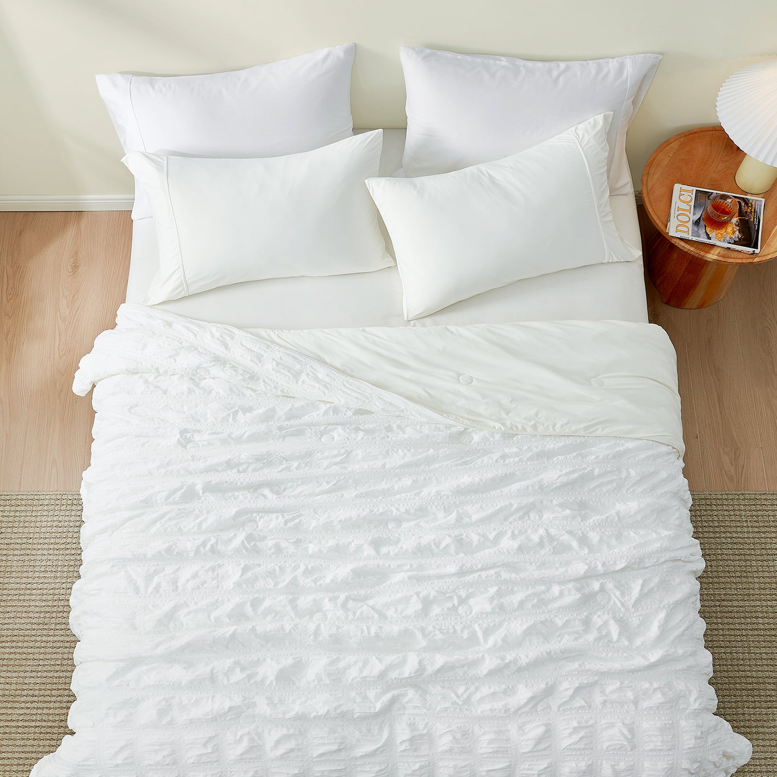 White seersucker cooling comforter set on a bed #Color_White Plaid