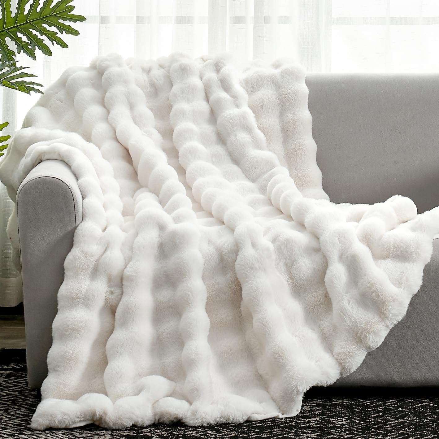 Bubble Faux Fur Throw Blanket, cozy white blanket on gray sofa #color_Cream White