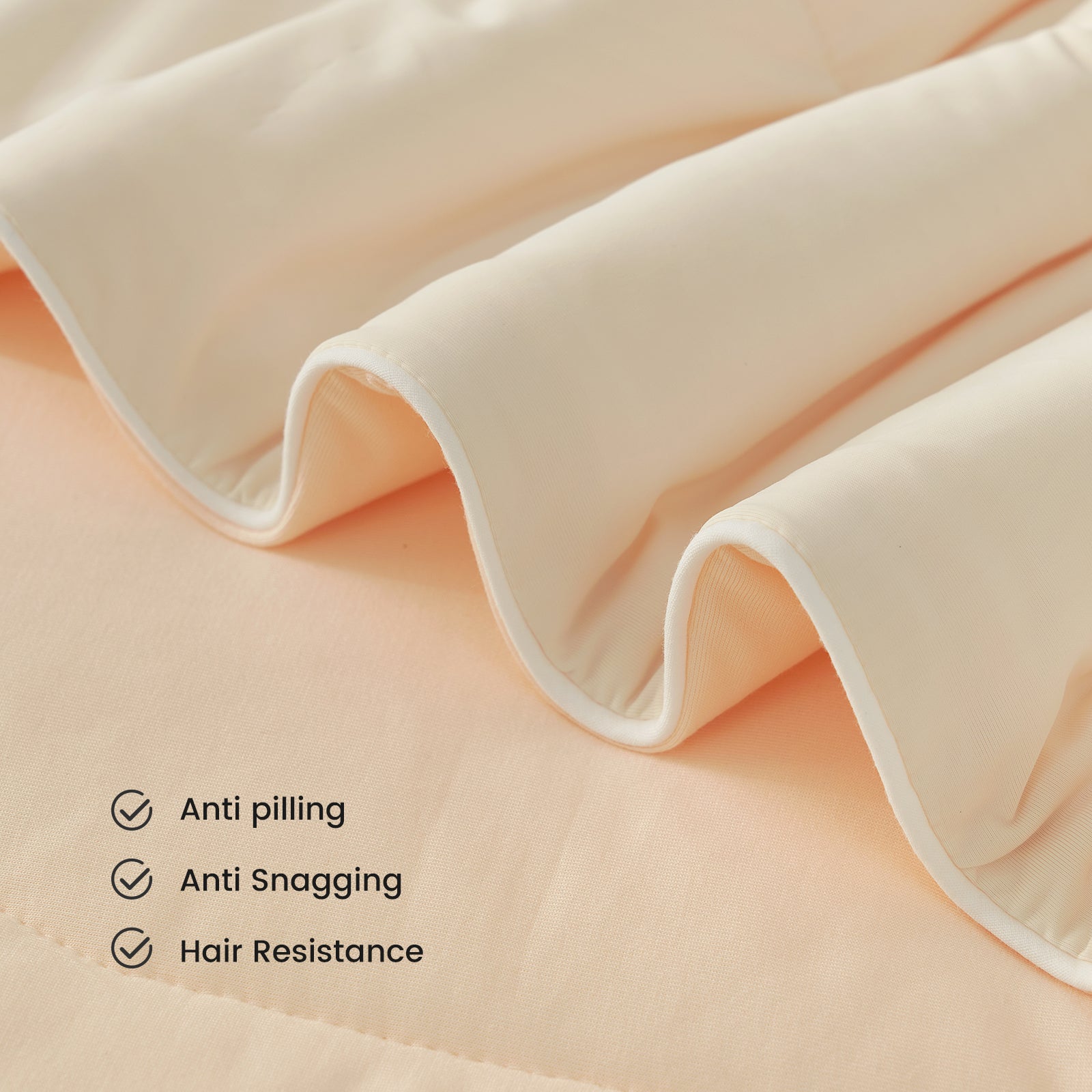 Cozy Bliss Cooling Comforter close-up: anti-pilling, snagging, and hair resistance. #color_Ivory