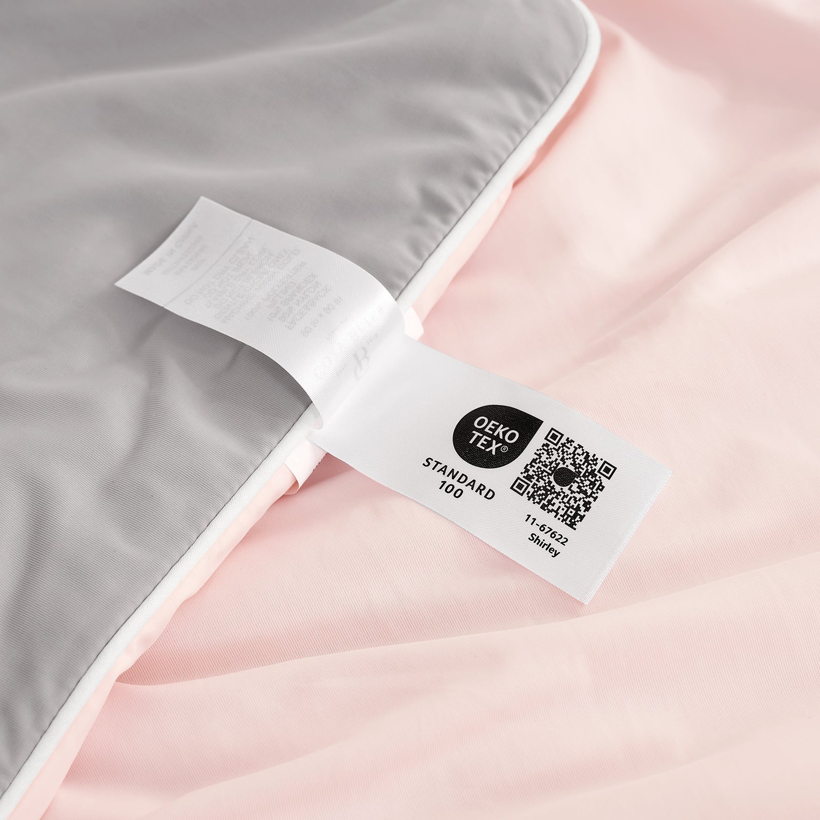 OEKO-TEX certified Cozy Bliss pink cooling comforter, soft and breathable bedding. #Color_Pink/Grey