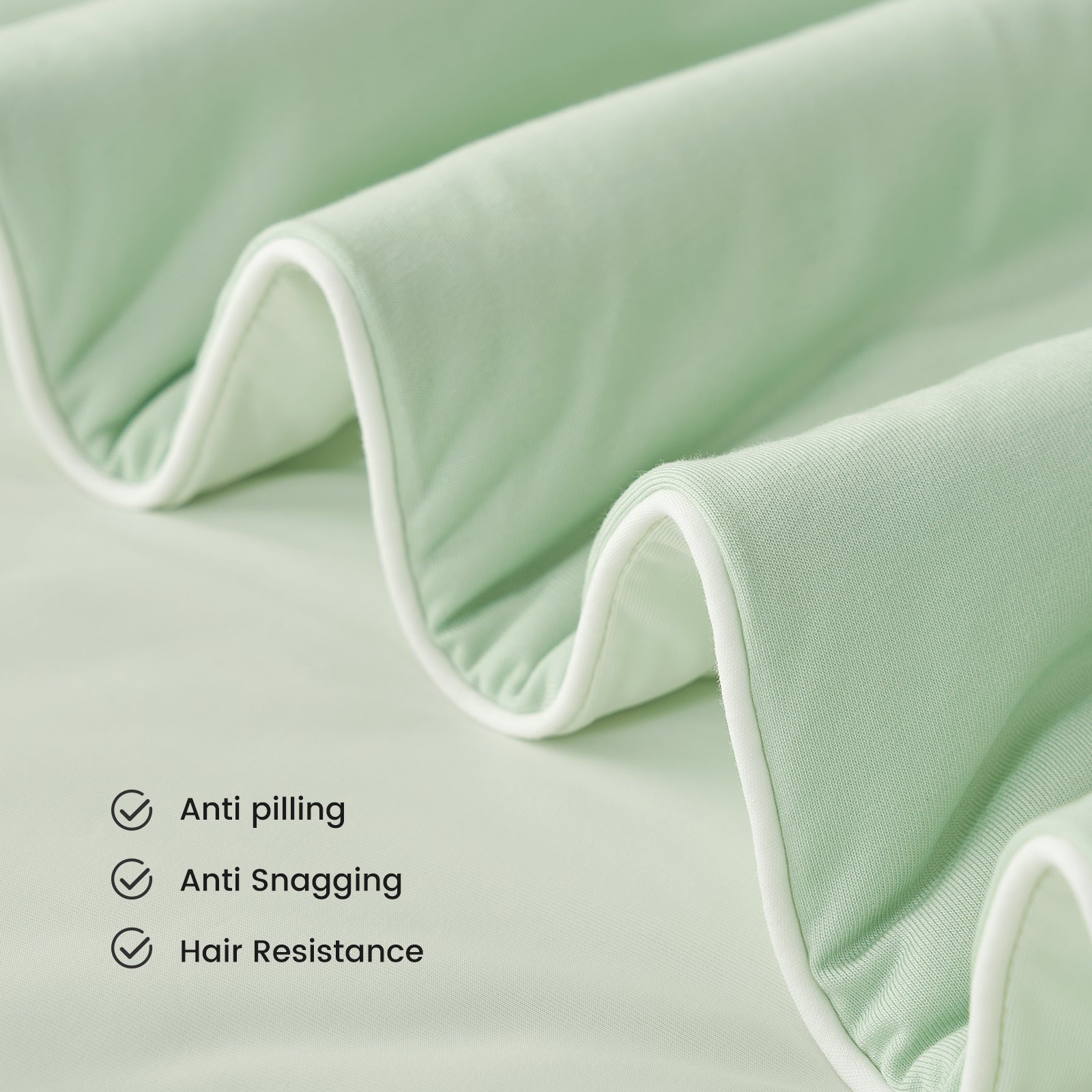 Mint green cooling comforter detail, anti-pilling, anti-snagging, and hair-resistant fabric from Cozy Bliss #color_Mint Green