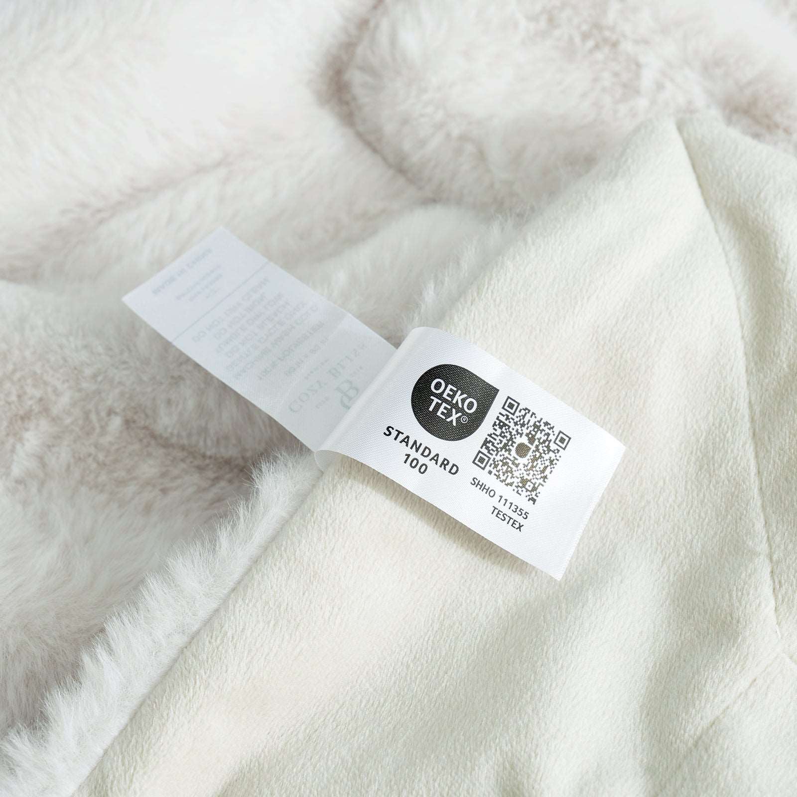 OEKO-TEX certified Cozy Bliss faux fur throw blanket #color_Beige