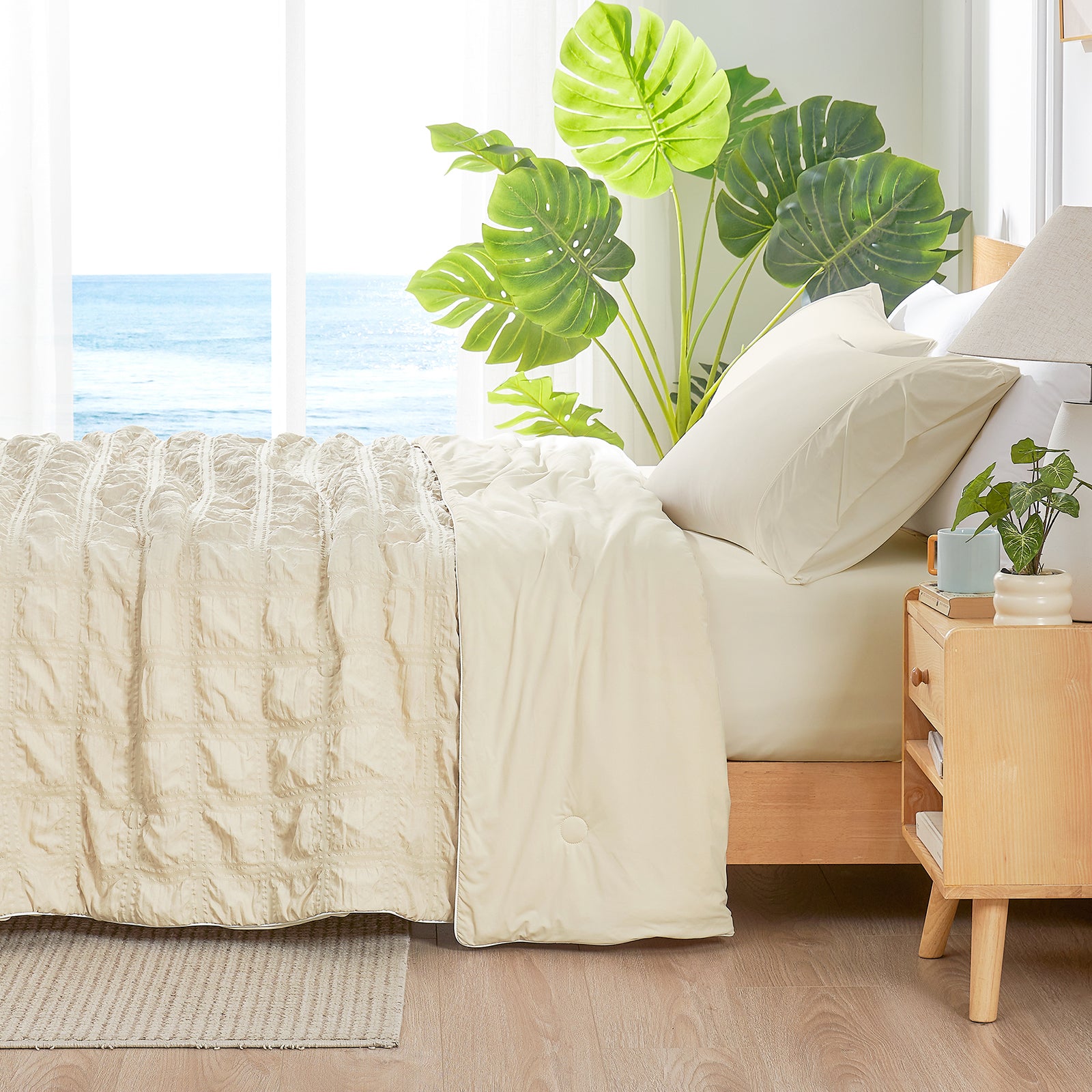 Bedroom with beige bedding, wooden nightstand, and decorative plants. #color_Khaki