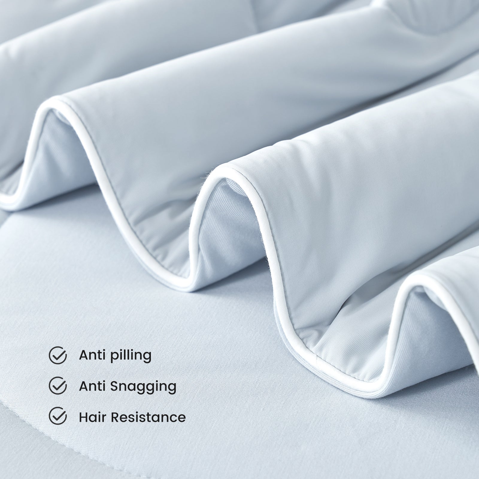 Cozy Bliss cooling comforter detail: anti-pilling, snagging, and hair resistance #color_Cool Blue