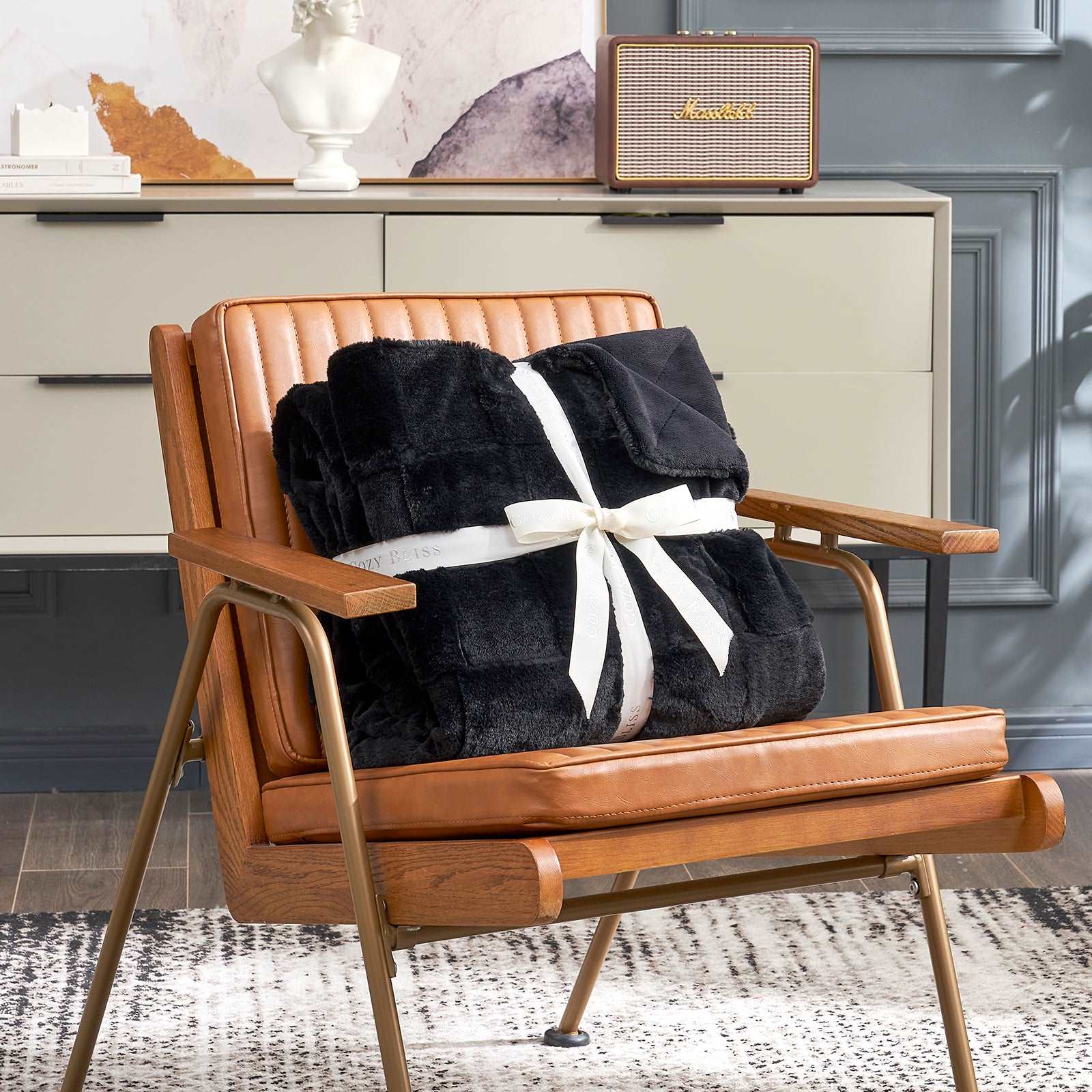 Cozy Bliss black faux fur throw blanket tied with ribbon, cozy bedding, perfect gift #color_Black