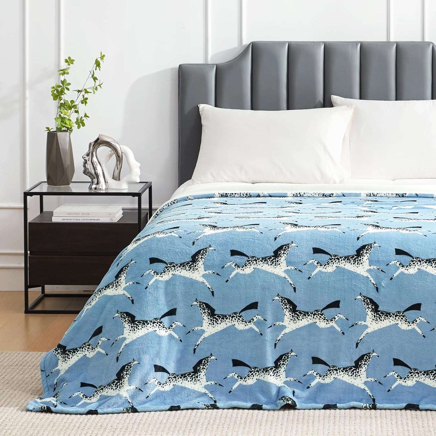 Blue fleece blanket with horse print on a bed #color_Running horse
