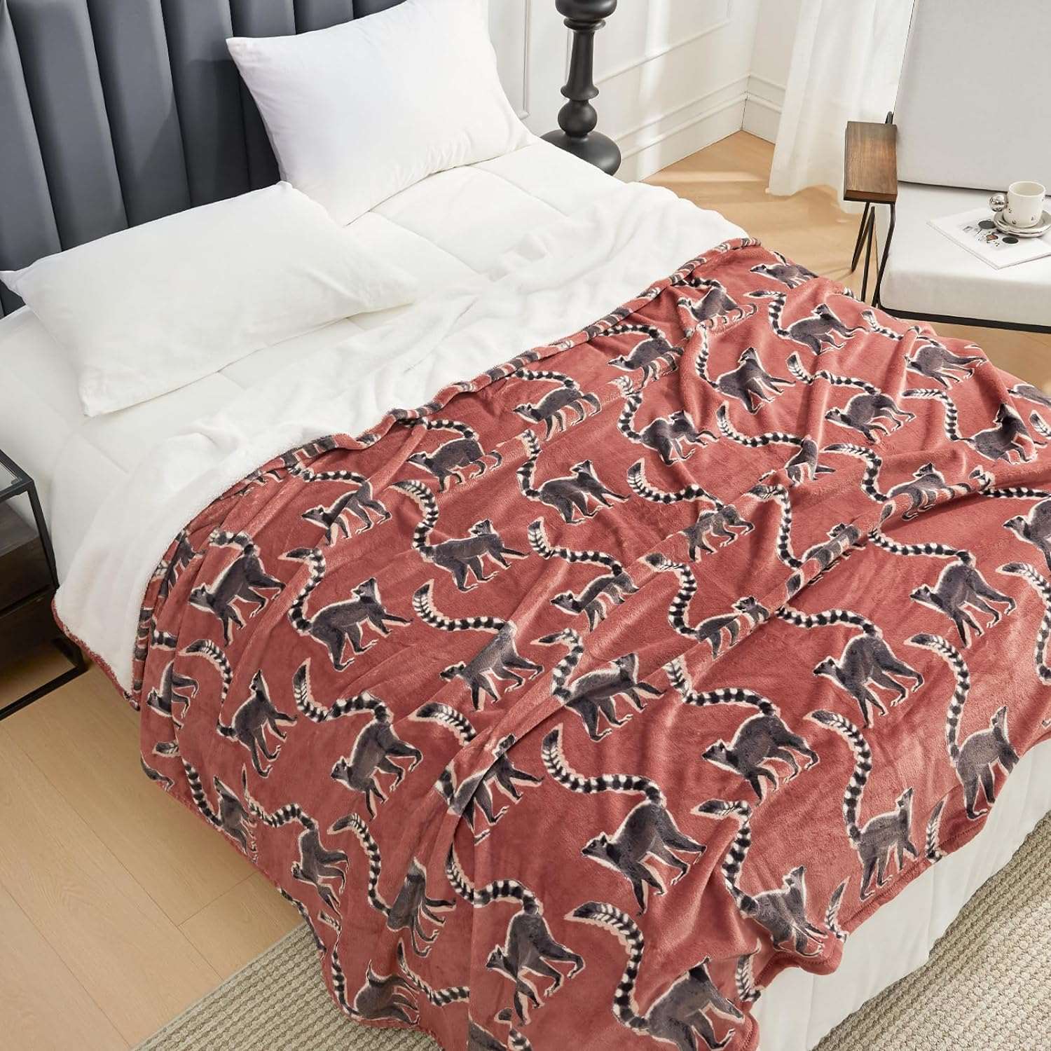 Lemur print fleece blanket on bed, cozy bedding #color_Proud Lemur