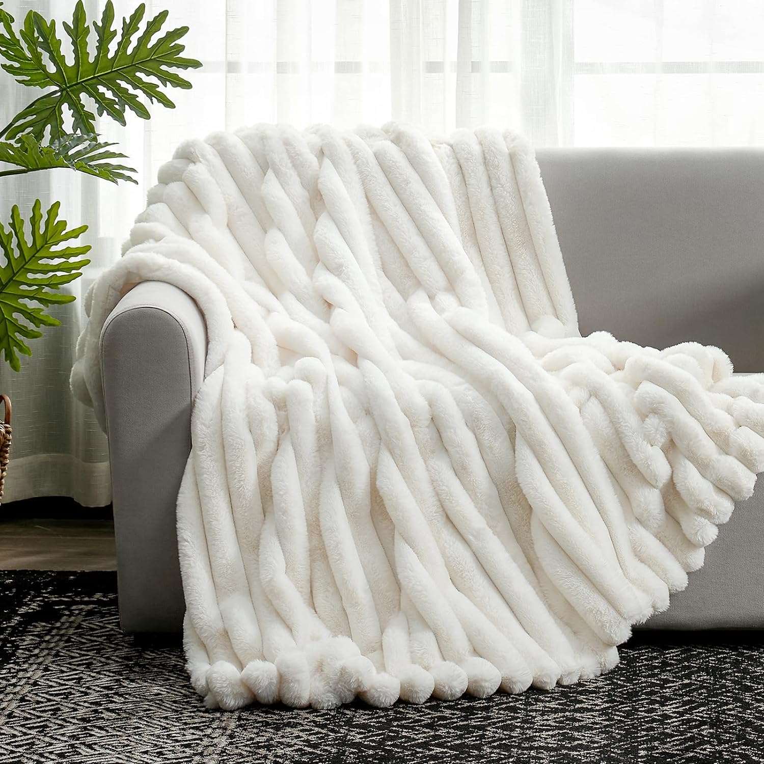 Cozy Bliss striped faux fur blanket on sofa, cozy home decor #color_Cream White