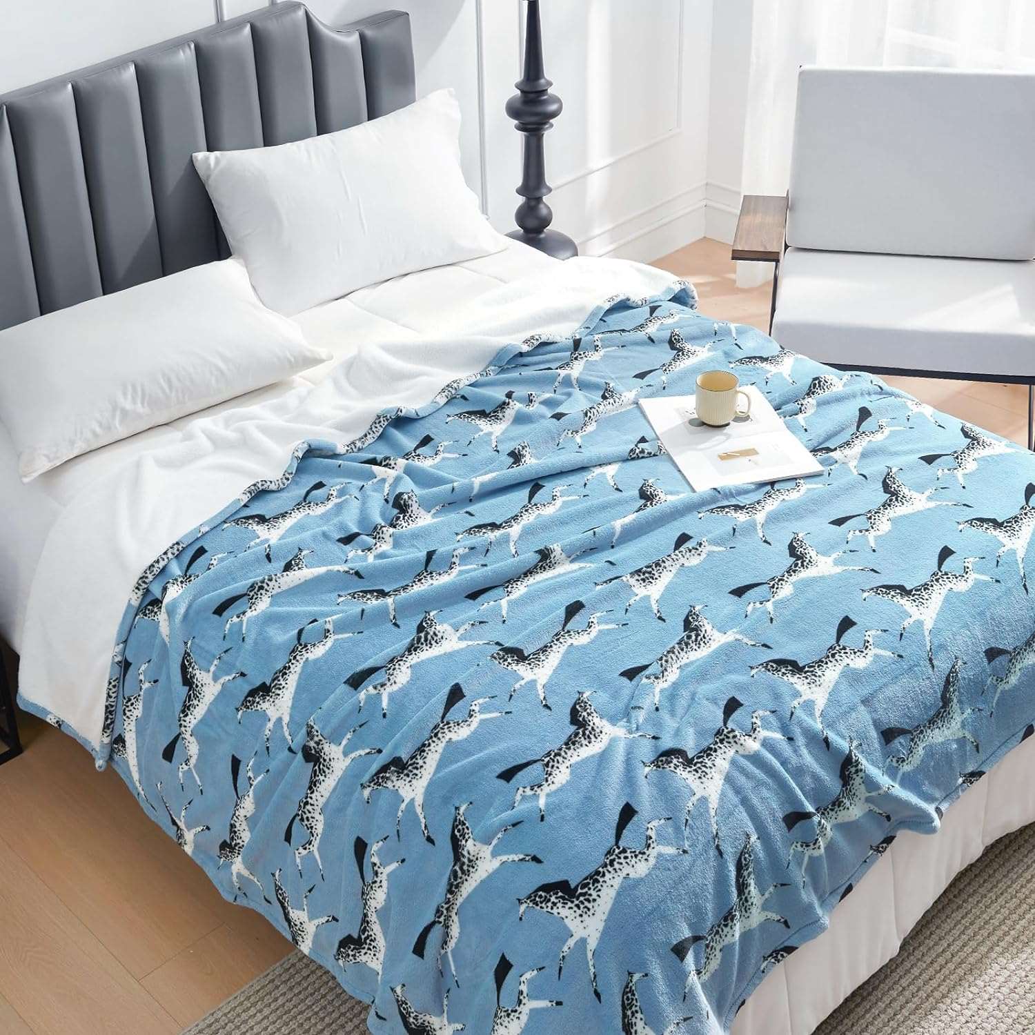 Blue fleece blanket with running horse pattern on bed #color_Running horse