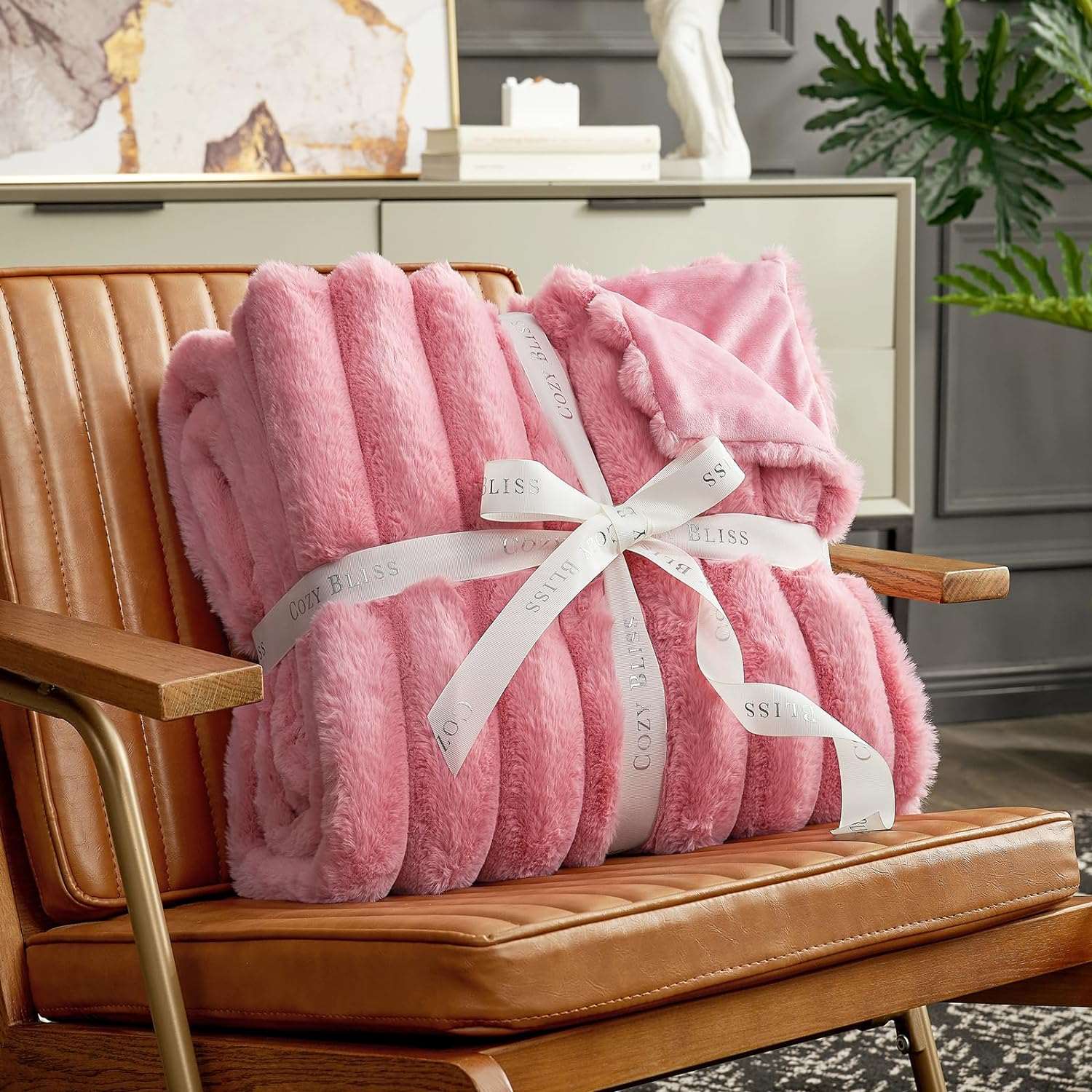 Cozy Bliss pink faux fur blanket, gift-ready and tied with a ribbon, cozy bedding #color_Hot Pink