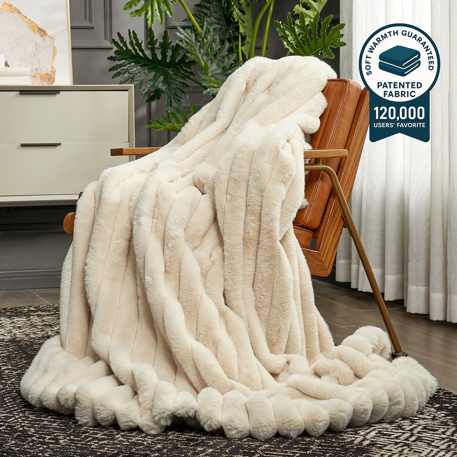 White fleece blanket draped over a wooden chair in a room with plants and furniture. #color_Beige