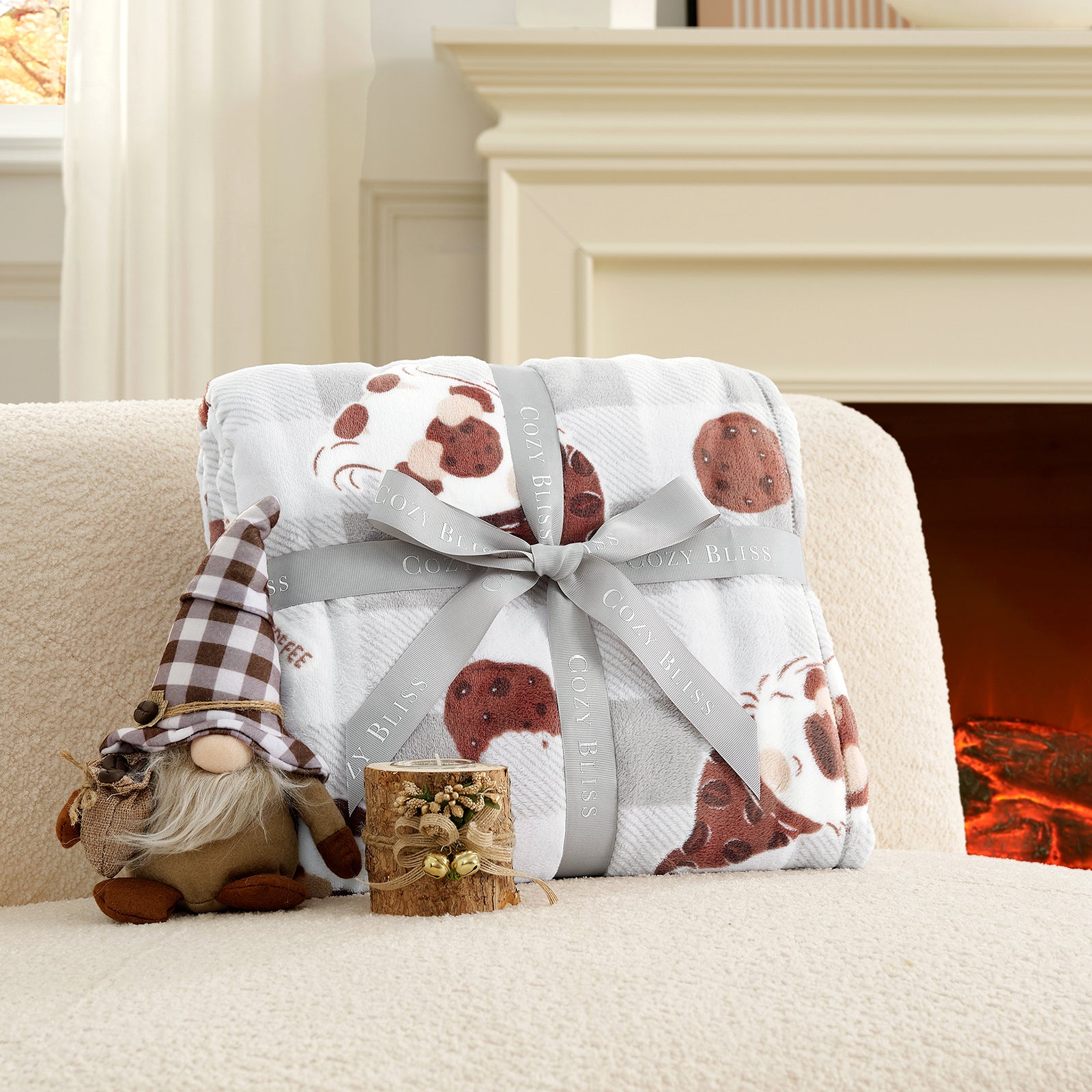 Gift wrapped in patterned paper with a bow on a couch next to a gnome and small wooden box, with a fireplace in the background. #color_Coffee Gnome Grey