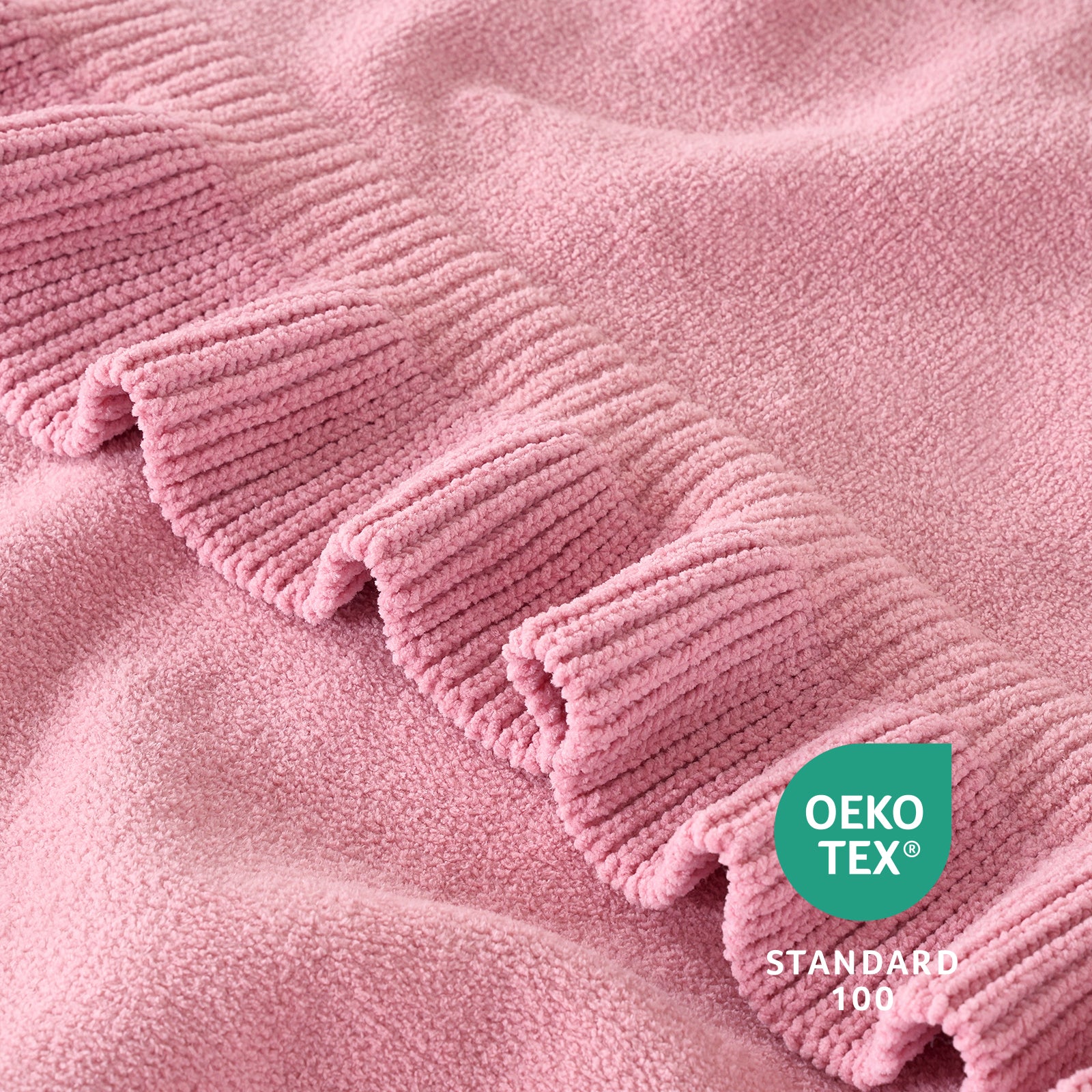 Close-up of ruffle edge on Ruffle Knit Chenille Throw Blanket in Pink with OEKO-TEX STANDARD 100 certification, highlighting soft texture and skin-friendly fabric. #color_Pink