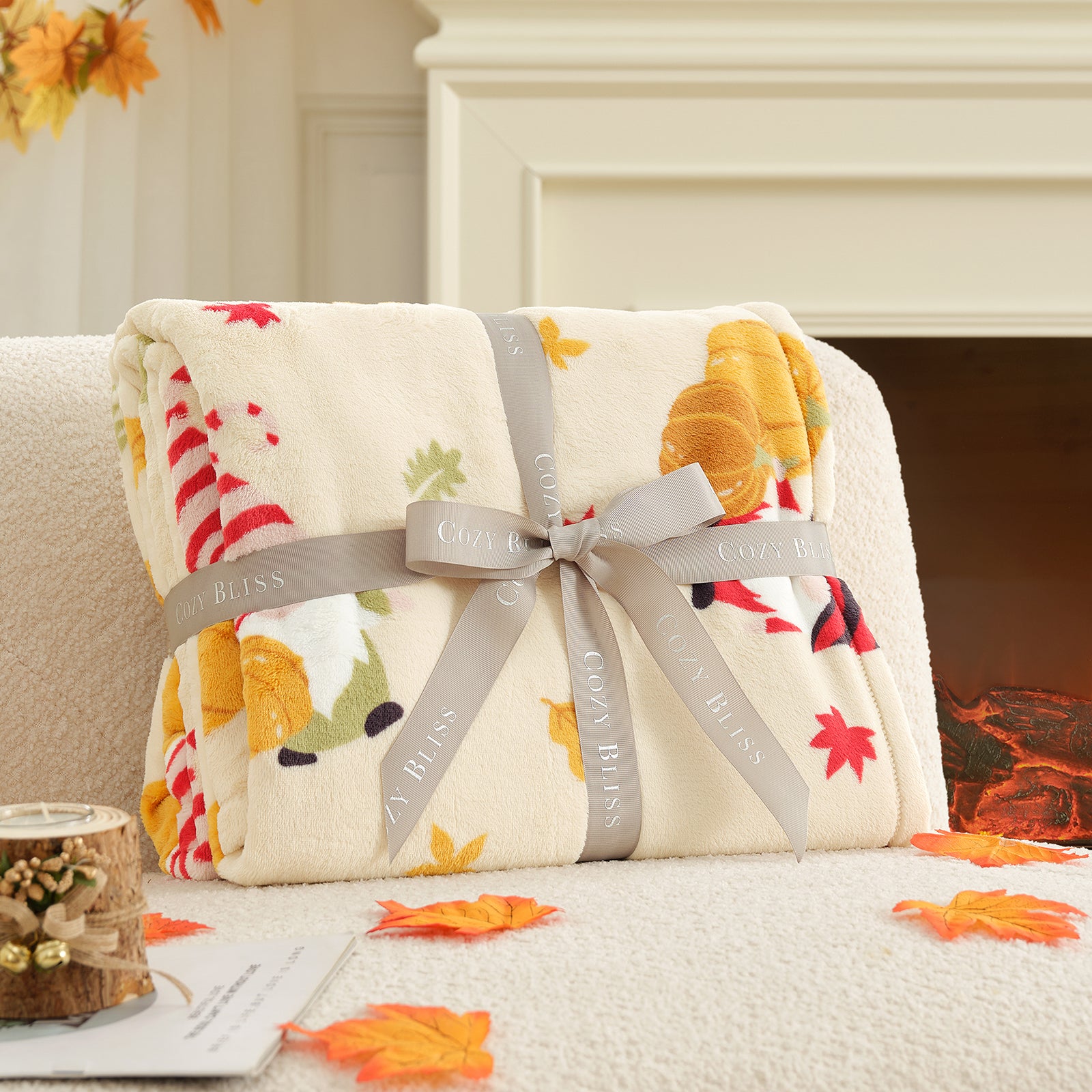Floral-patterned blanket with a ribbon on a couch in front of a fireplace. #color_Pumpkin Gnome