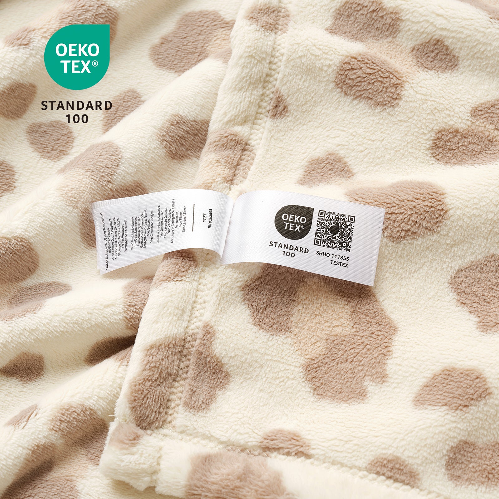 Patterned fabric with an OEKO-TEX label on a beige background #color_Khaki Leopard