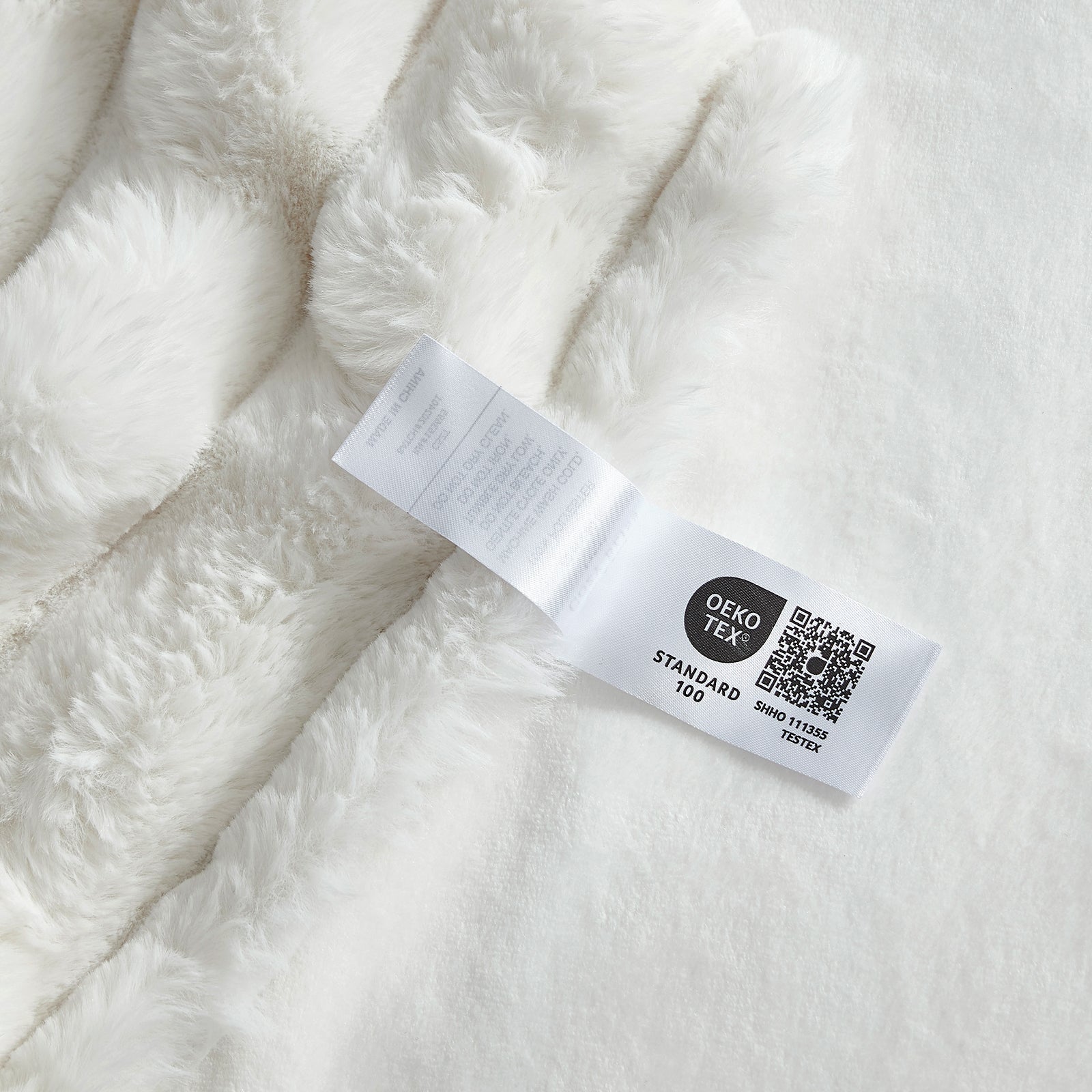 OEKO-TEX certified Cozy Bliss faux fur blanket #color_Cream White