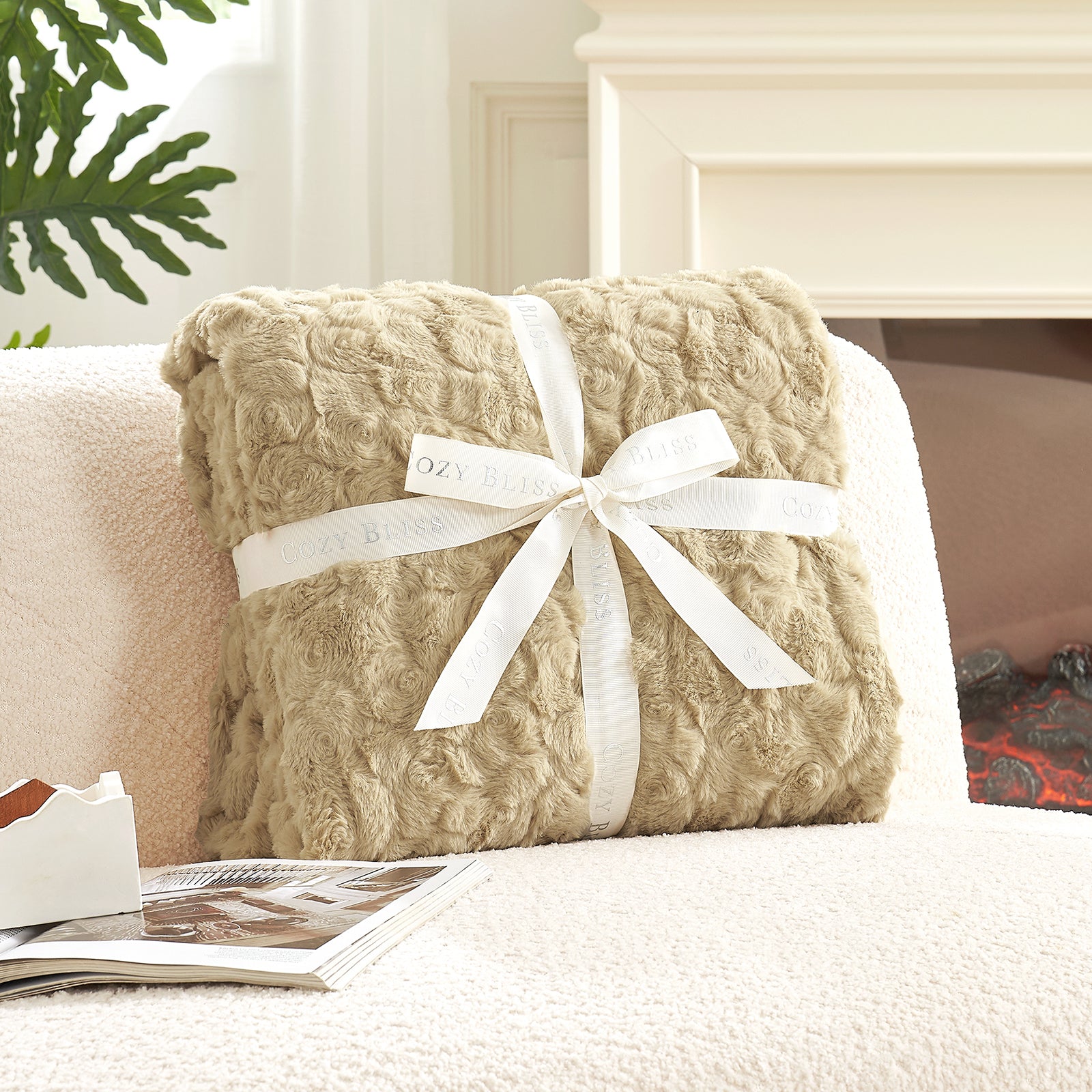 Beige textured blanket with a white ribbon on a bed #color_Khaki