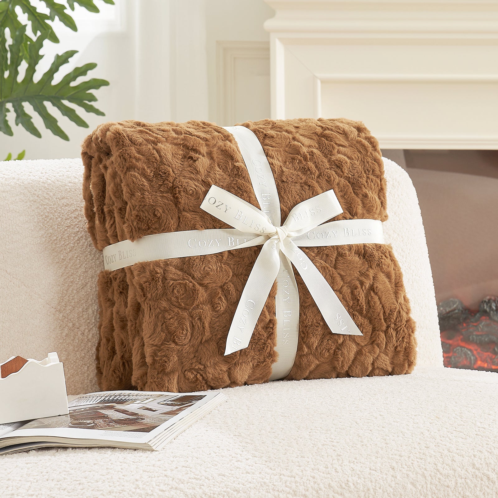 Brown textured blanket with a white ribbon on a white surface #color_Brown